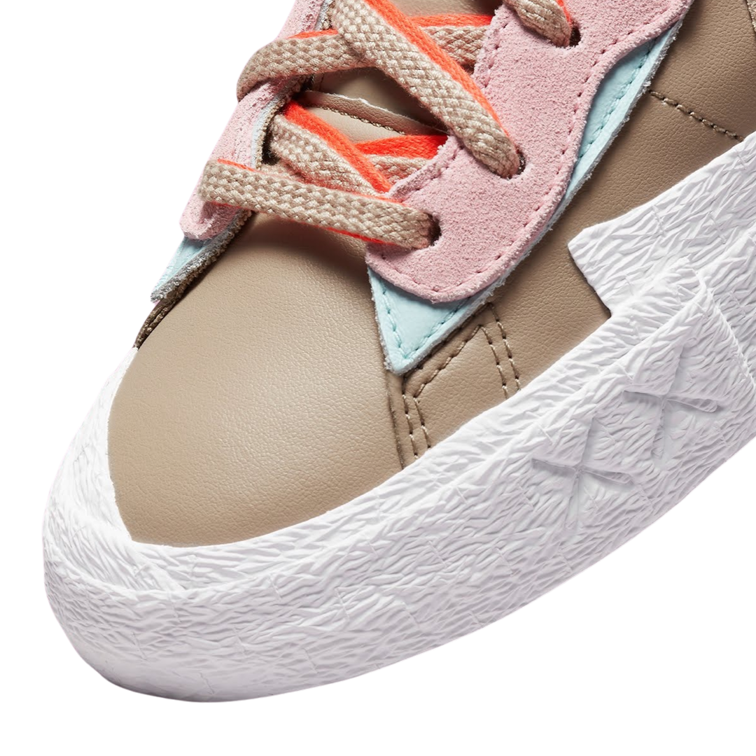 KAWS x Nike x Sacai Blazer Low Sneakers - Reed Bright Spruce White Colorway - Limited Edition Collab Shoes for Streetwear & Sneaker Collectors | Perfect for Casual Wear, Sneakerhead Collections & Urban Fashion