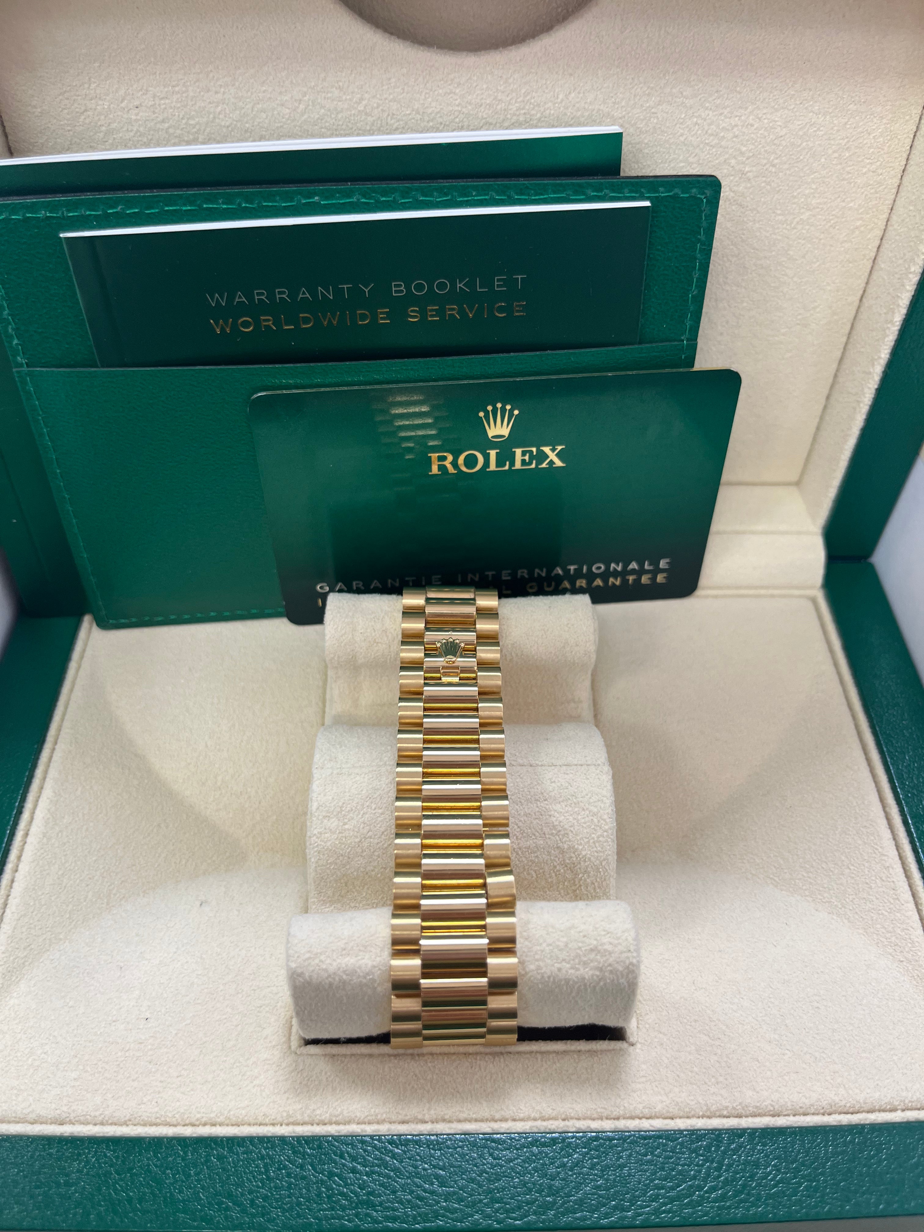 Rolex Day Date 40 18k Yellow Gold Watch with Baguette Diamond Dial & Fluted Bezel (Ref# 228238) - Luxury Timepiece for Business Meetings, Formal Events & Special Occasions