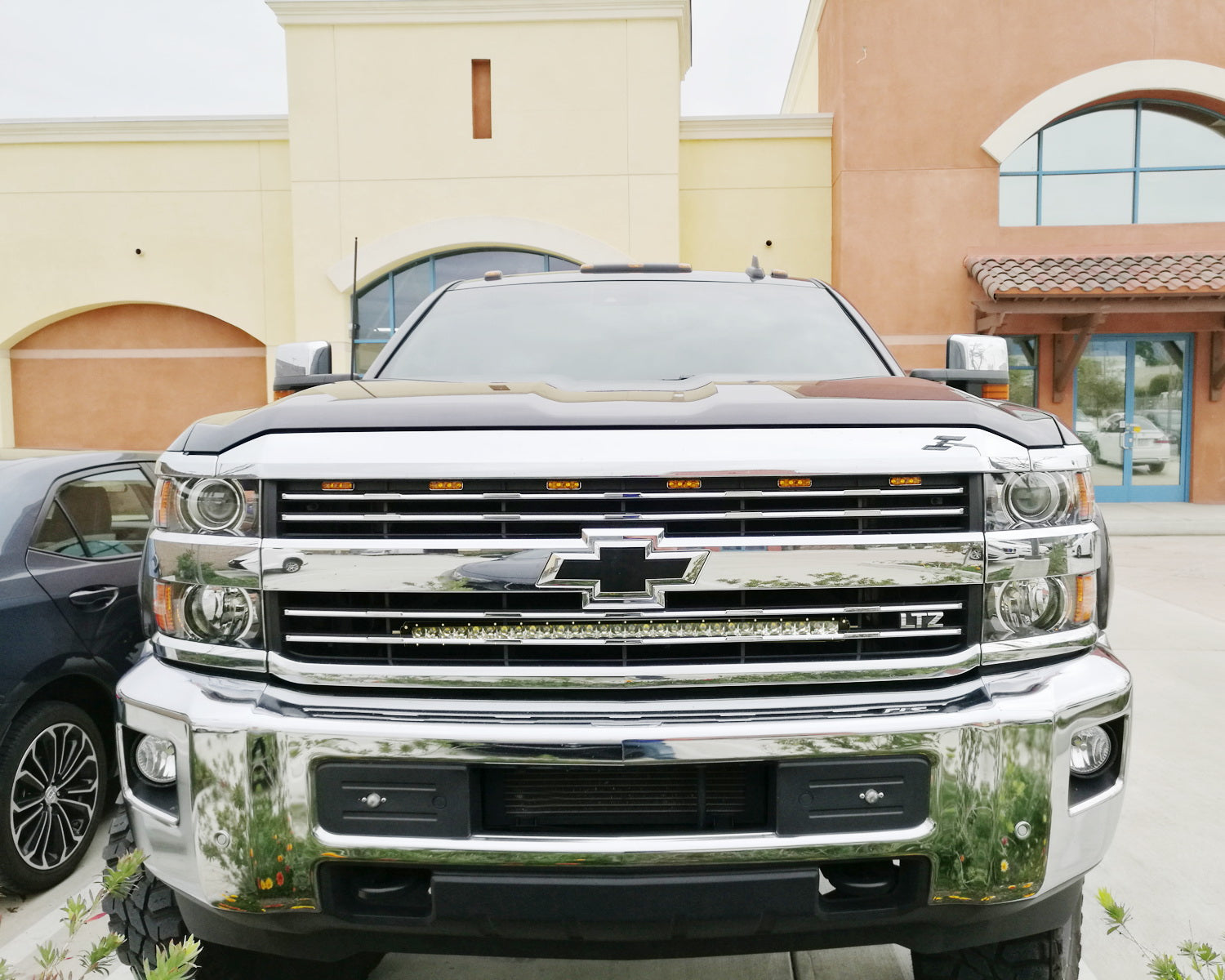 150W 30-Inch CREE LED Light Bar with Behind Grille Mounting Bracket & Wiring Harness - Compatible with Chevy Silverado 1500/2500/3500 - Perfect for Off-Roading, Hunting, and Night Driving