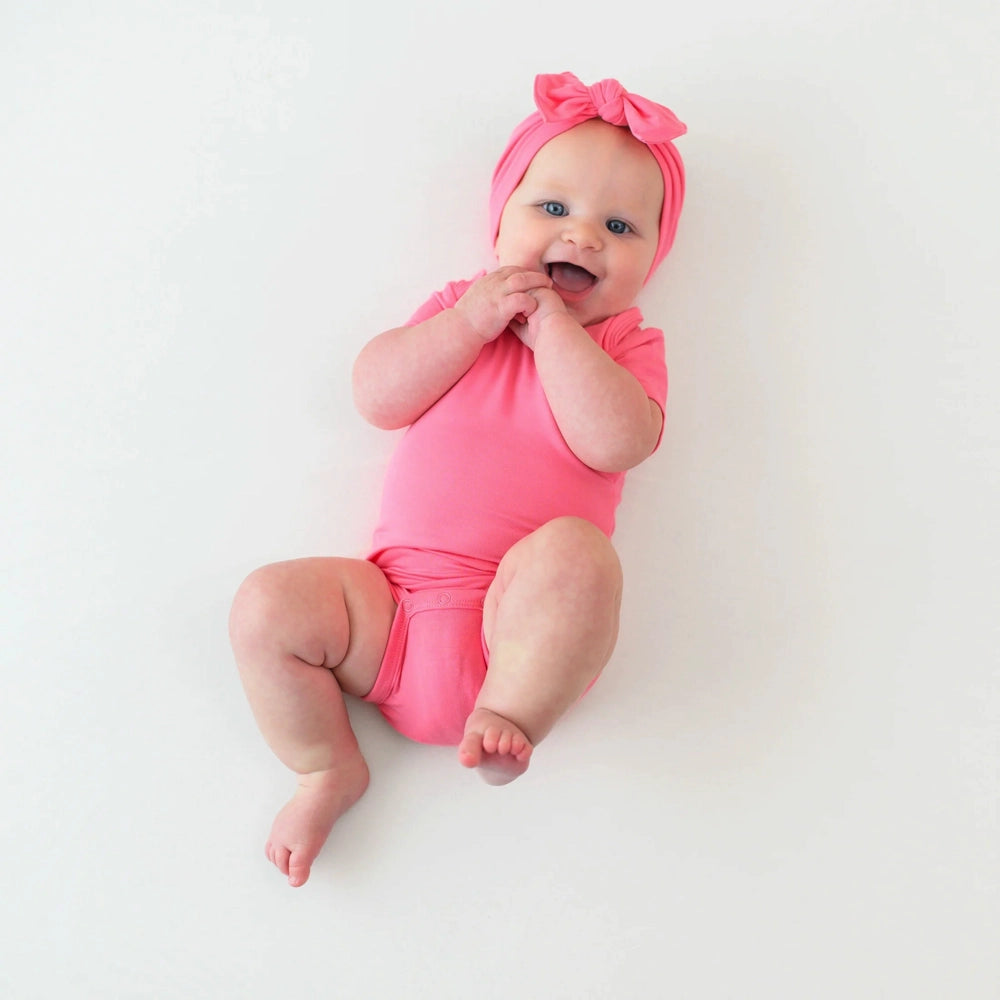 Kyte Baby Short Sleeve Bodysuit - Soft Cotton Infant Onesie in Guava Pink | Comfortable & Breathable for Playtime, Daycare & Summer Outfits