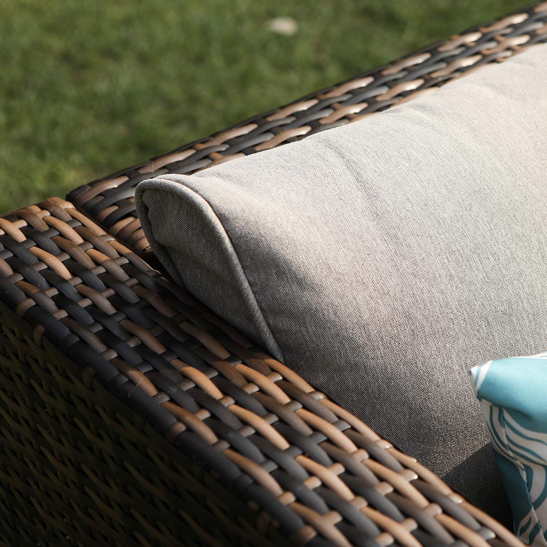 All-Weather Mottlewood Brown Wicker Patio Chair with Thick Gray Cushions & Teal Pattern Pillow - Durable Outdoor Furniture for Garden, Poolside, and Deck Relaxation