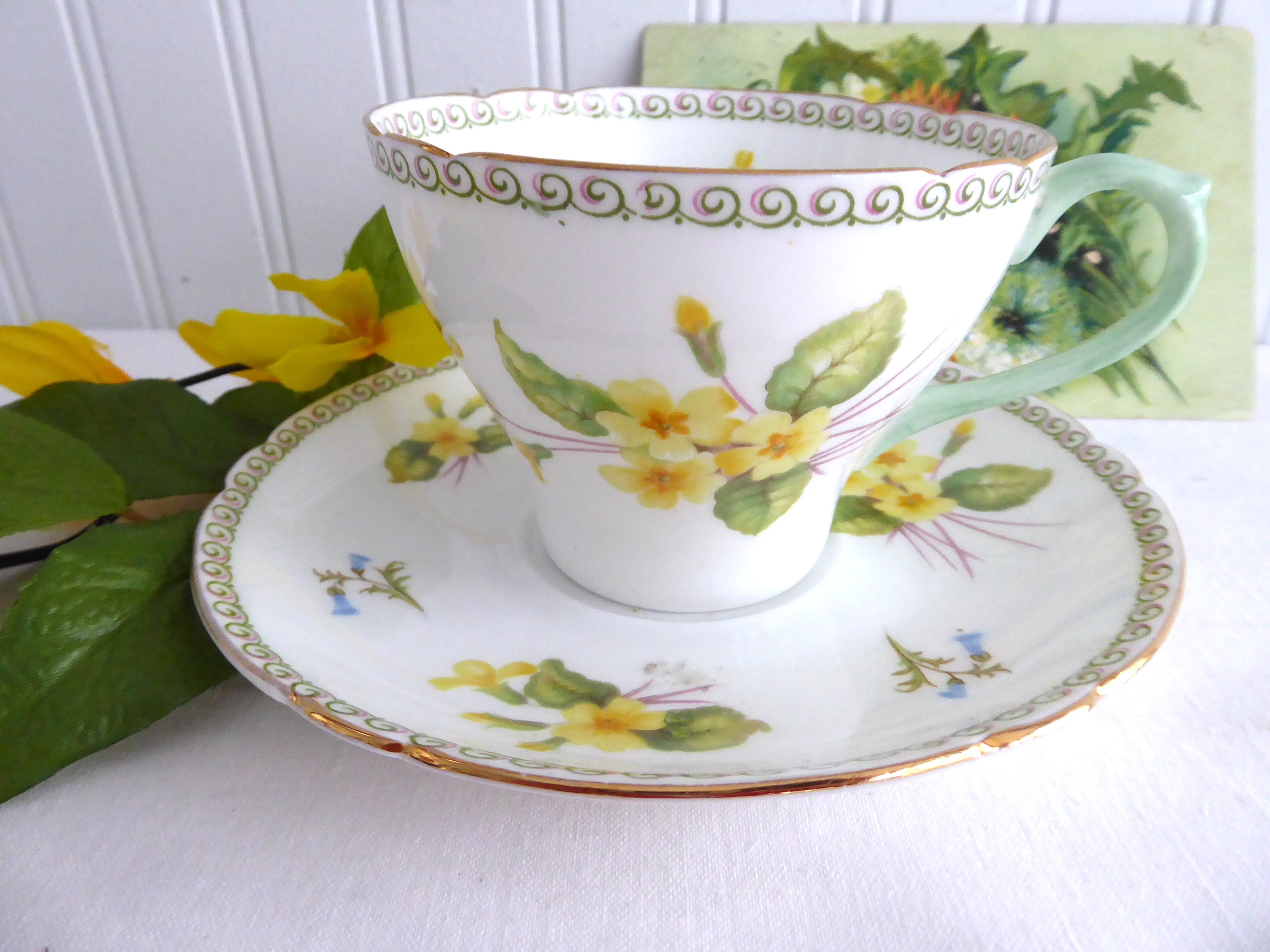 Vintage Shelley Primrose Cambridge Cup and Saucer Set with Green Handle & Gold Trim - 1950s English Fine China for Afternoon Tea & Collectible Display