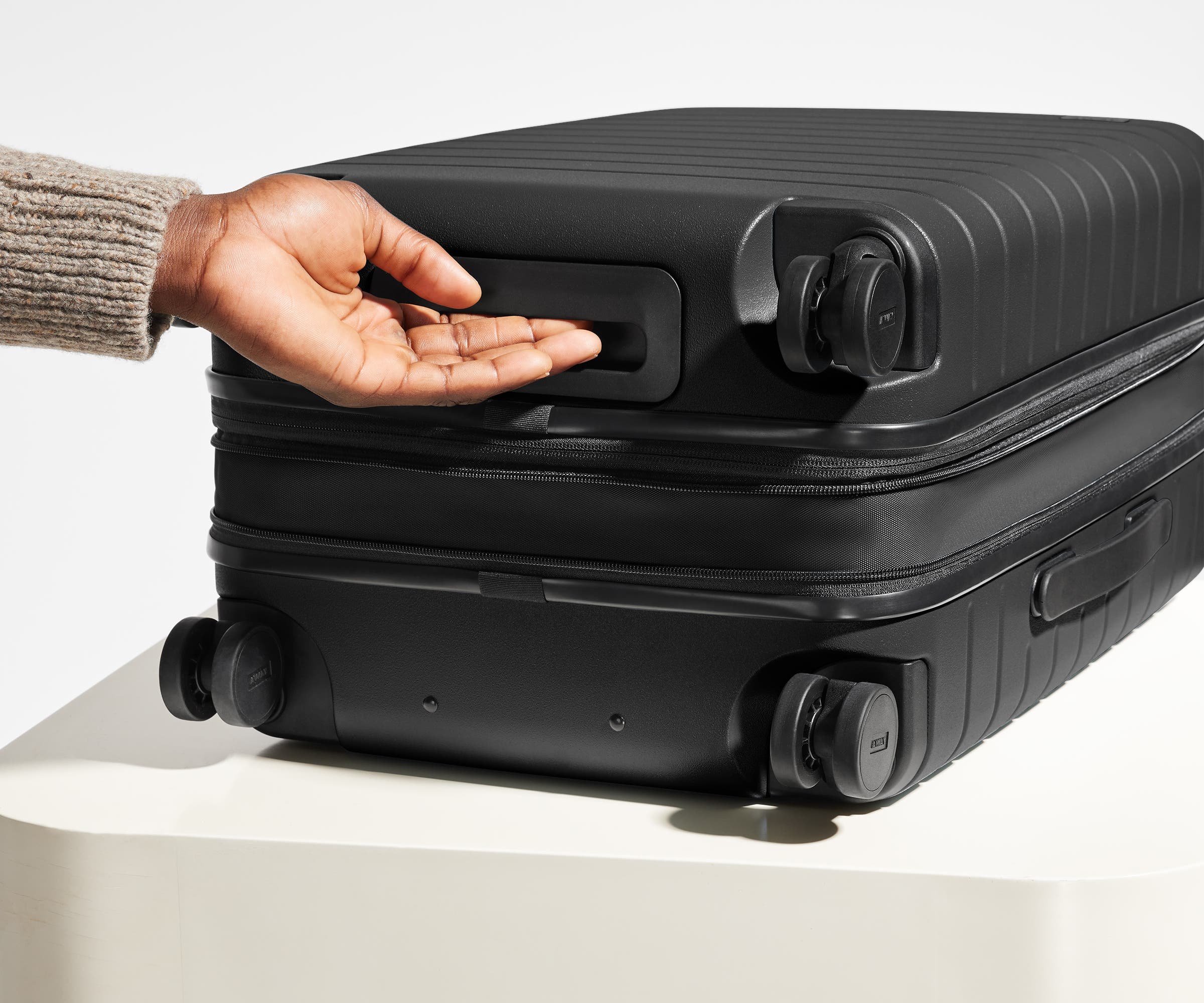 The Carry On Flex in Jet Black - Lightweight Expandable Luggage for Travel, Business & Weekend Getaways