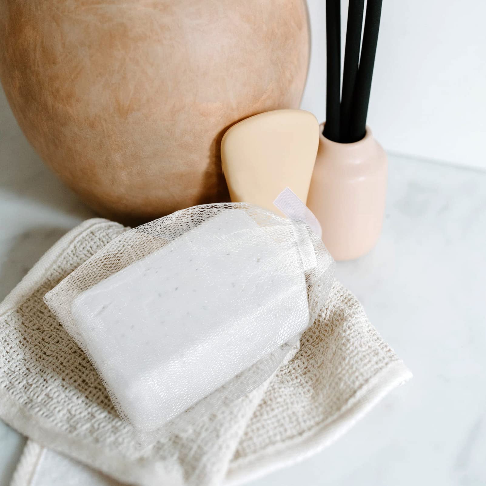 FOMIYES Exfoliating Face Soap Pouch - 2 Pack Reusable Soap Net for Body & Facial Cleansing | Gentle Skin Scrubber for Shower, Travel & Daily Skincare Routine