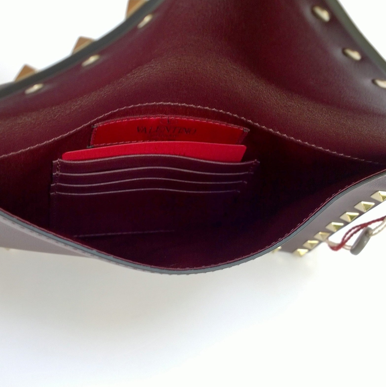 Valentino Garavani V Flap Oxblood Leather Rockstud Envelope Pouch with Wrist Strap Small - Luxury Crossbody Bag for Women, Perfect for Evening Parties & Date Nights