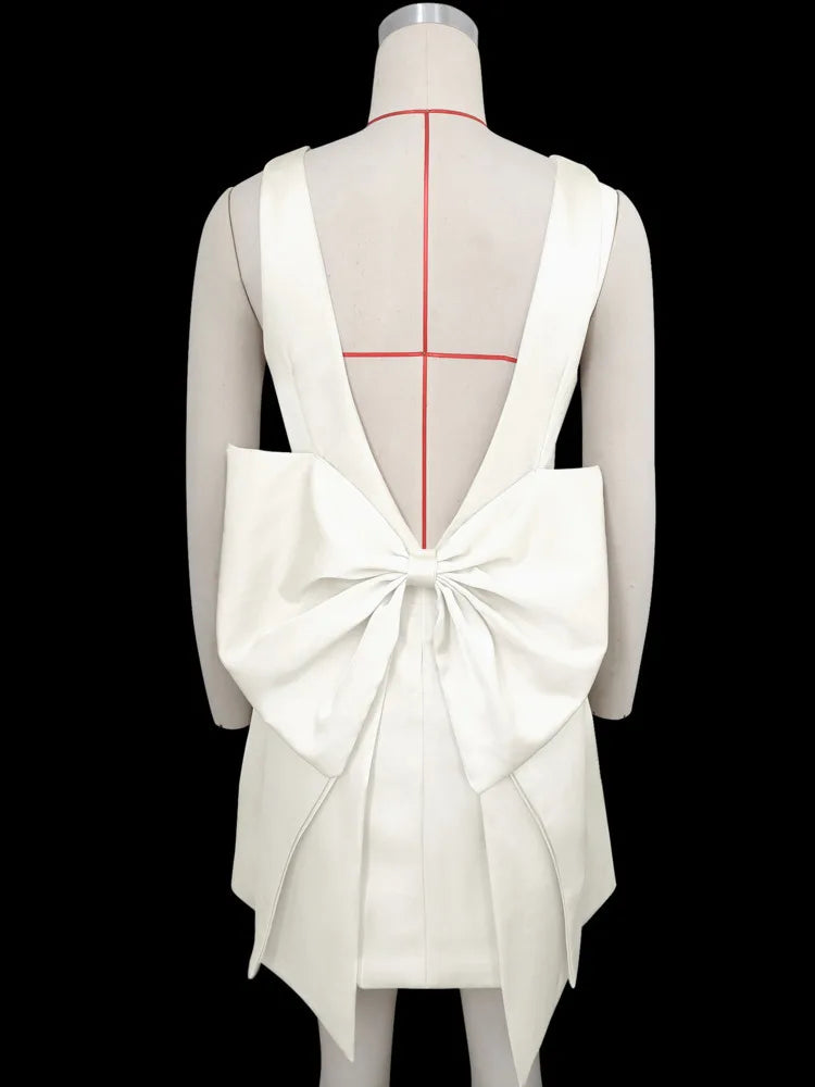 Sexy Backless Mini Dress for Women - Elegant Bow Sleeveless Club Dress with High Waist & Solid O-Neck Design | Perfect for Nightclub Parties, Date Nights & Special Occasions