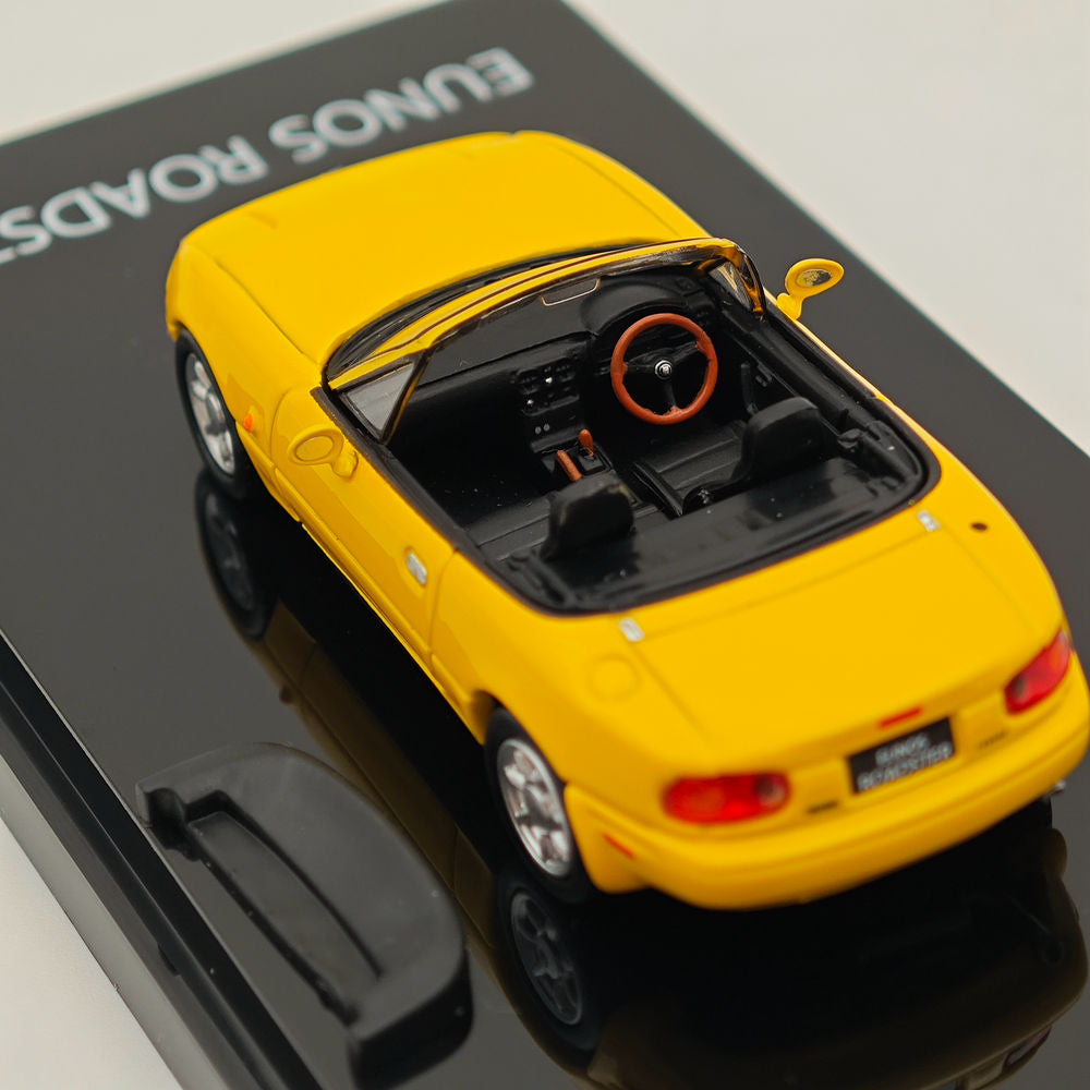 1/64 Scale Mazda Eunos Roadster NA6CE Diecast Model Car with Tonneau Cover - Limited Edition Yellow HJ642025BY - Collectible Hobby Japan Toy for Car Enthusiasts & Gift Ideas - Perfect for Display, Racing Scenes & Diecast Collections