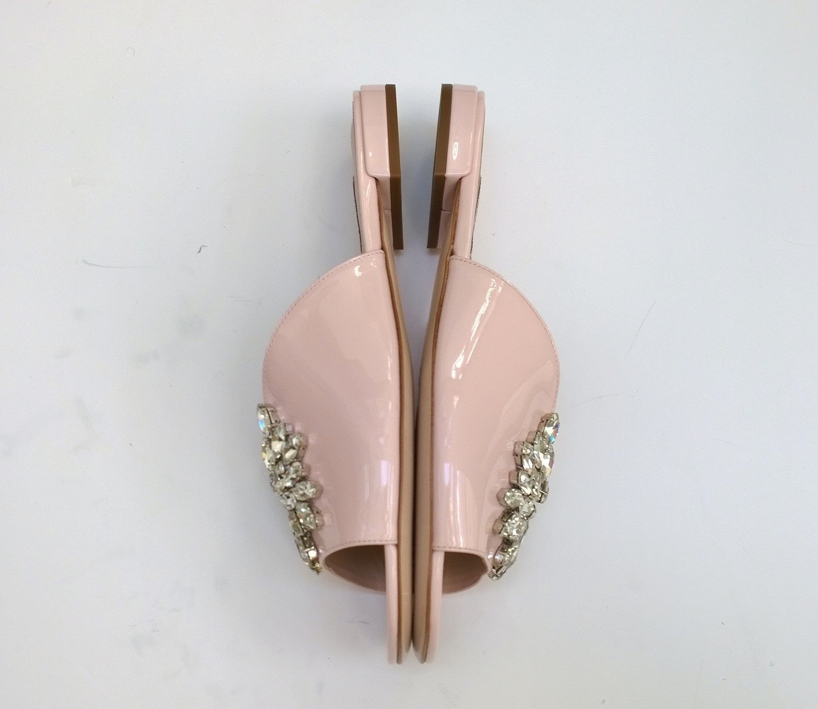 Miu Miu Women's Pink Patent Leather Sandals with Leaf Crystal Accents - Flat Slides for Summer, Beach, and Casual Outings