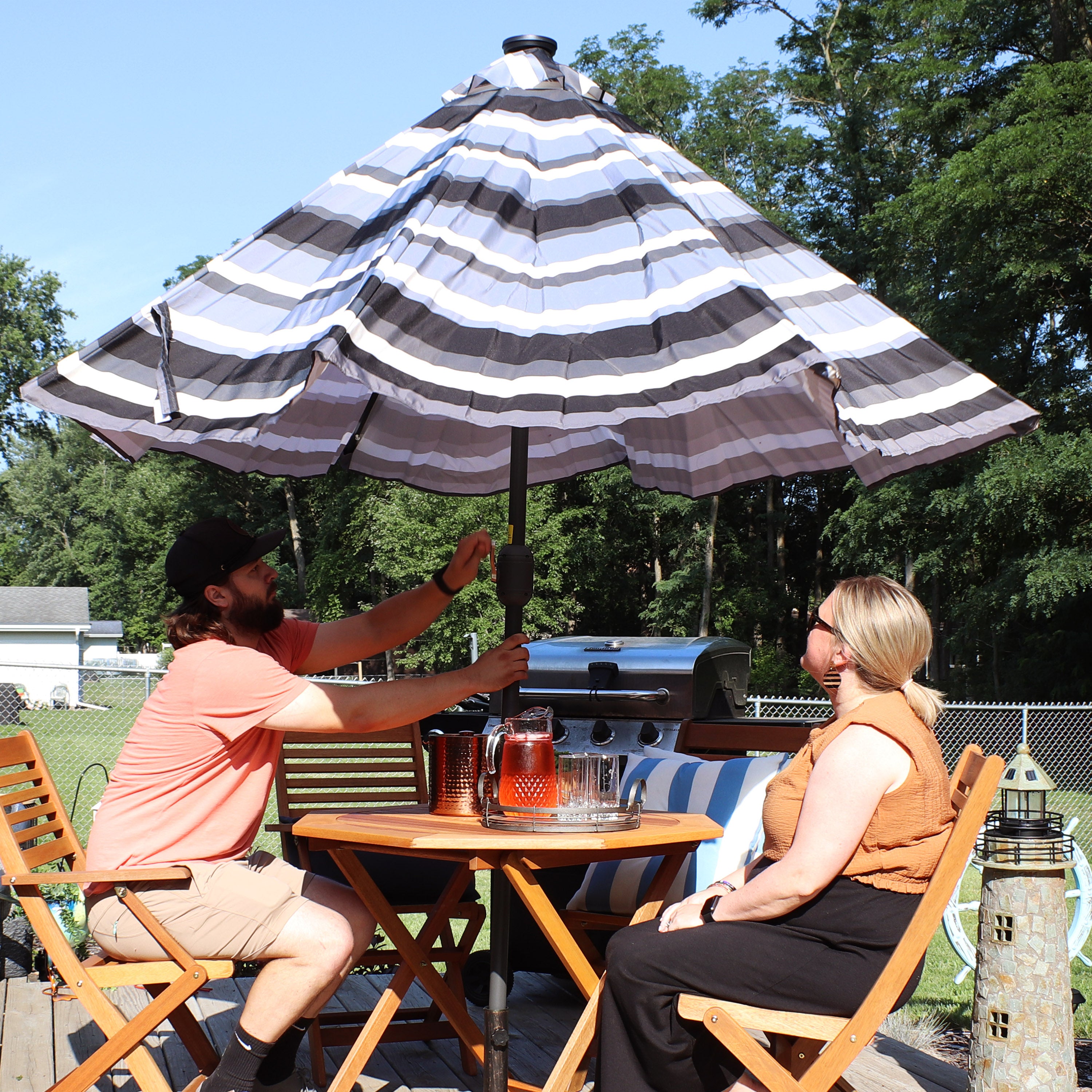 Sunnydaze 9-Foot Striped Outdoor Patio Umbrella with Built-in Solar LED Lights - Perfect for Backyard, Poolside, and Beach Relaxation