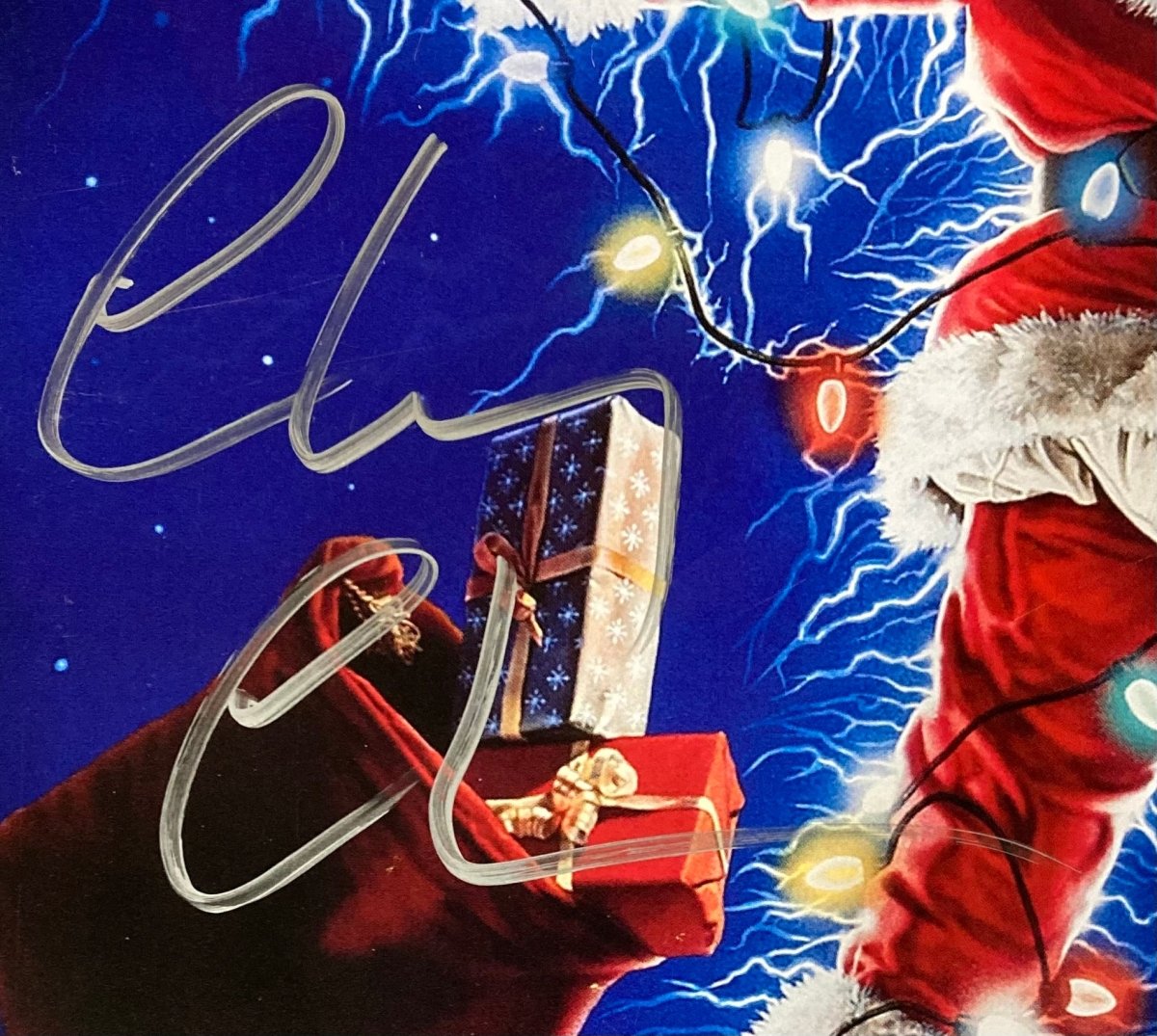 Chevy Chase & Beverly D'Angelo Autographed 11x17 Christmas Vacation Movie Photo with JSA Certificate - Perfect for Holiday Decor, Movie Memorabilia Collectors & Christmas Vacation Fans