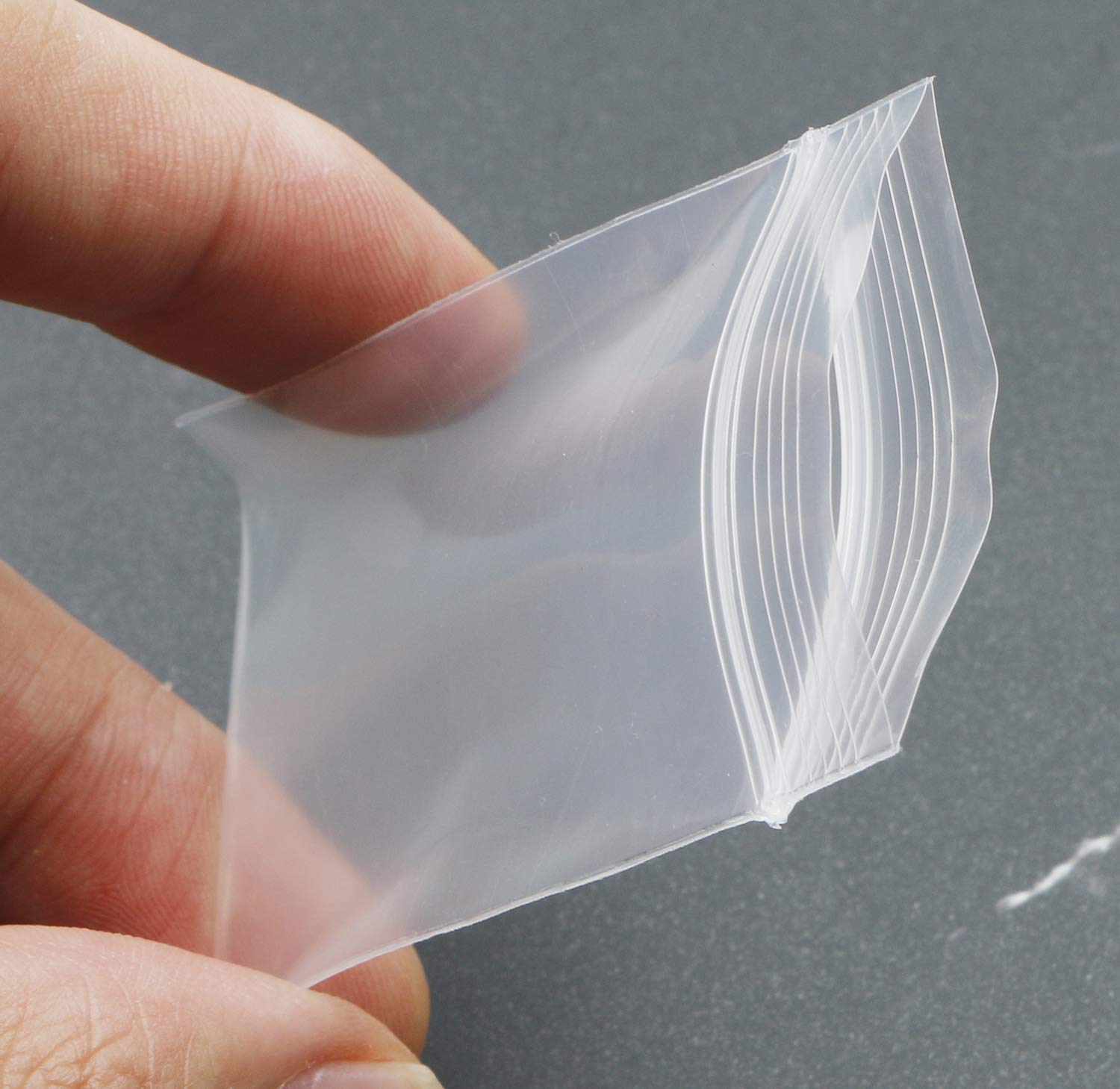 Ellbest 1.6x2.4 Inch Resealable Small Plastic Bags - 500Pcs 3.15 Mil Clear Reclosable Zipper Storage Bags for Jewelry, Candy, Beads, Crafts - Perfect for Organizing Small Items at Home, Office, or Travel