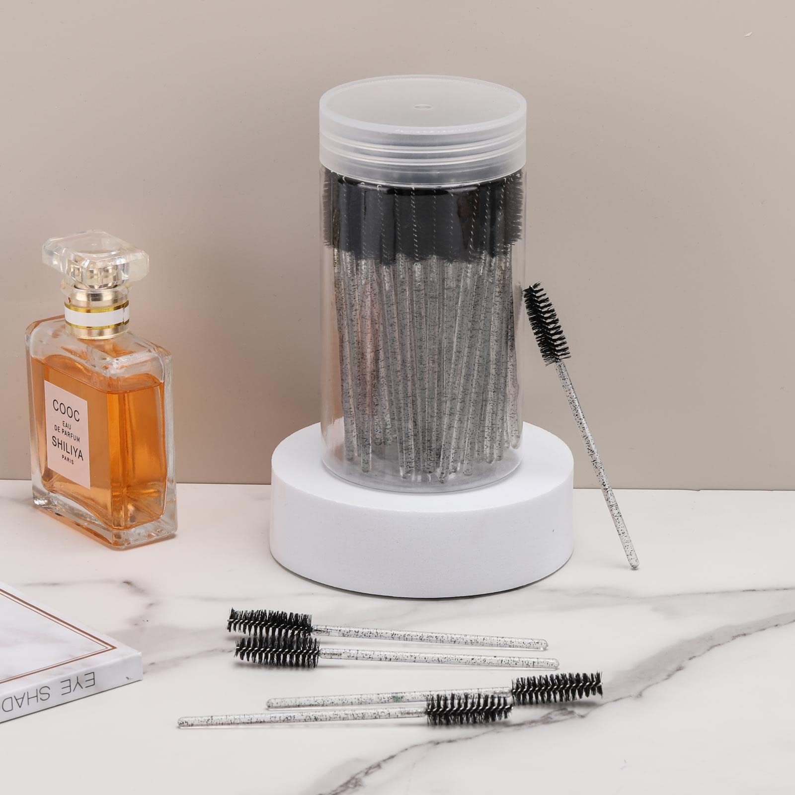 100 Pcs Disposable Mascara Wands - Crystal Eyebrow Spoolie Brushes for Eyelash Extensions & Makeup Application - Black Lash Brushes with Storage Container - Perfect for Salons, DIY Beauty & Professional Makeup Artists
