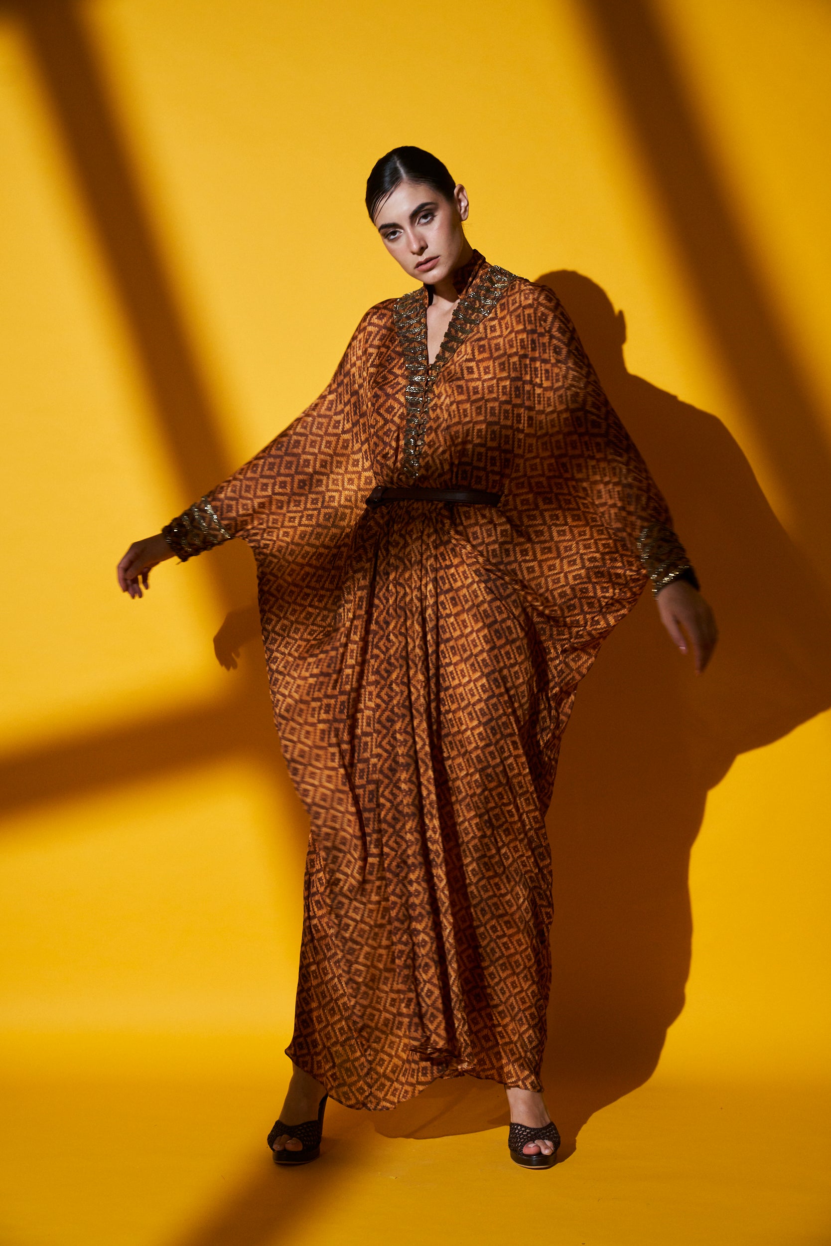 Archana Puran Singh Beige Brown Basket Weave Print Pleated Maxi Dress with Embroidered Belt - Elegant Boho Chic Dress for Summer Parties, Weddings & Beach Vacations