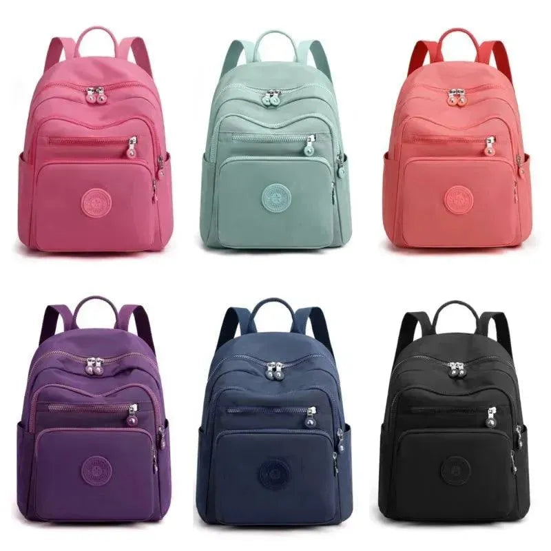 Waterproof Nylon Women's Travel Backpack - Lightweight Carry On Backpack for Airplane, Hiking & Outdoor Adventures