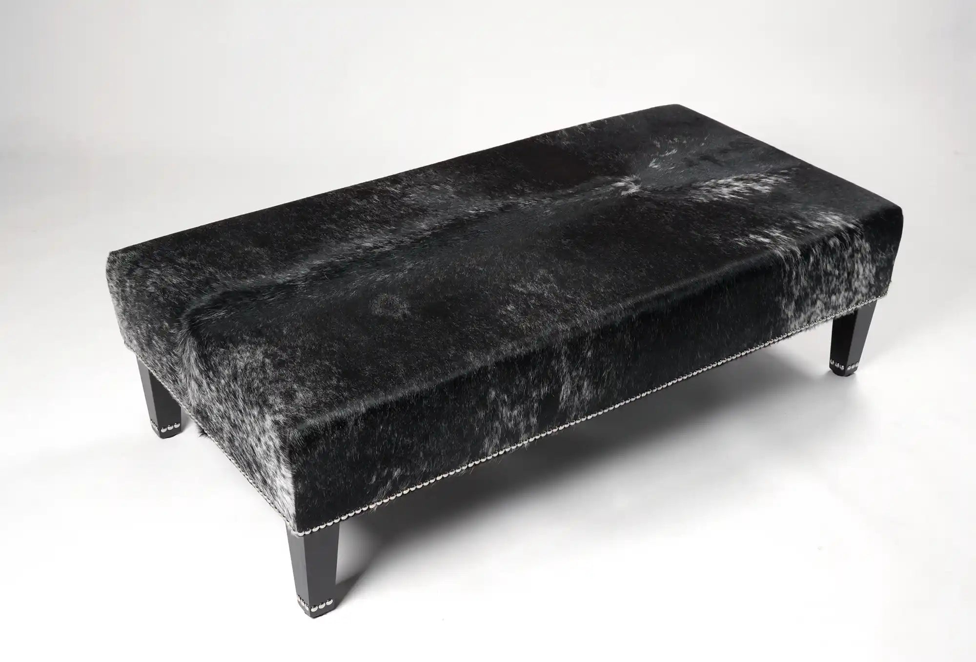 Premium Cowhide Ottoman with Sturdy Wood Stud Legs - 51