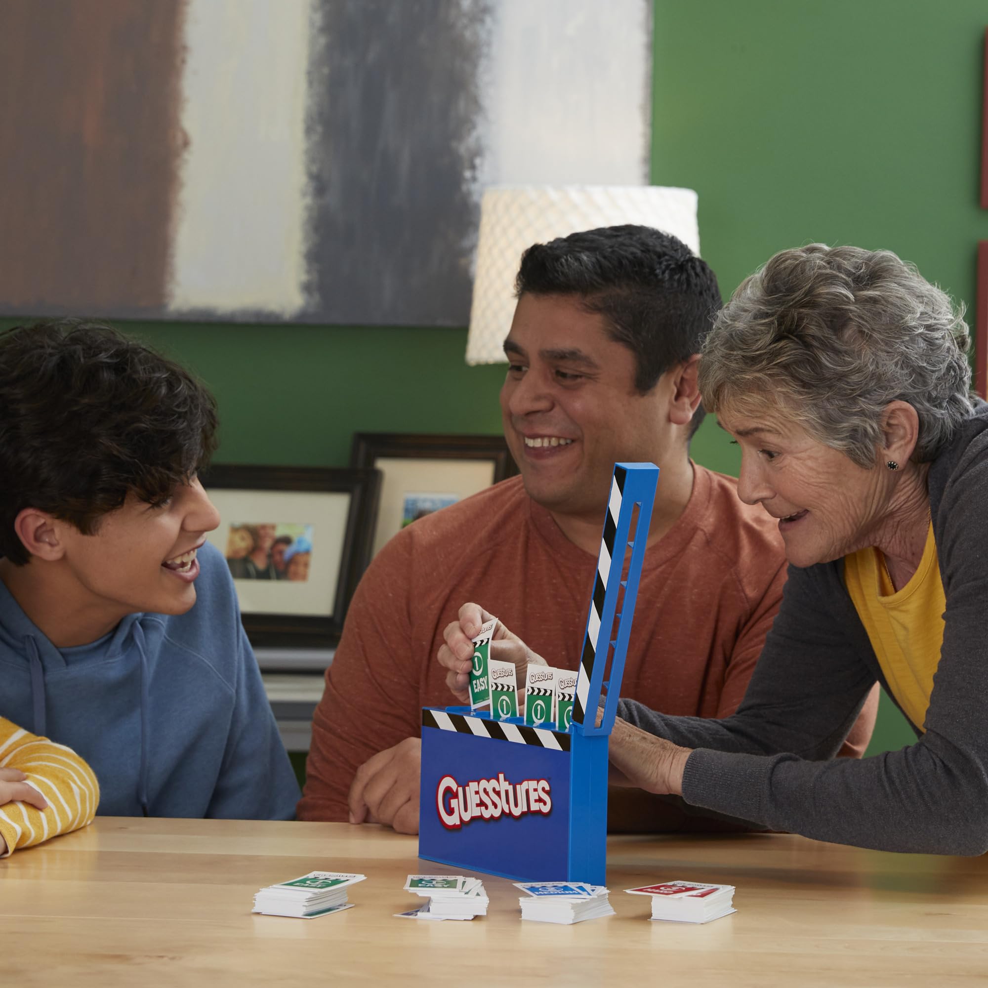 Hasbro Gaming Guesstures - Fun Family Charades Party Game for 4+ Players Ages 8 & Up | Perfect for Game Nights, Birthday Parties & Team Building Activities