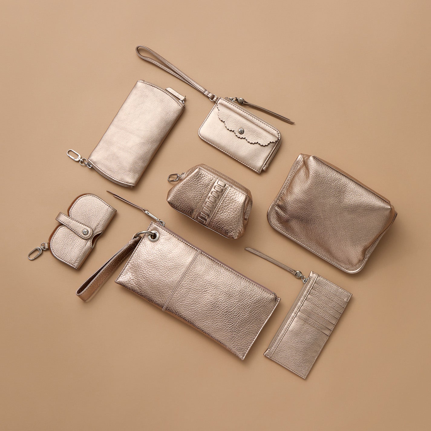 Vida Metallic Leather Wristlet in Cameo Quartz - Stylish Crossbody Wallet for Women, Perfect for Parties, Travel & Everyday Use