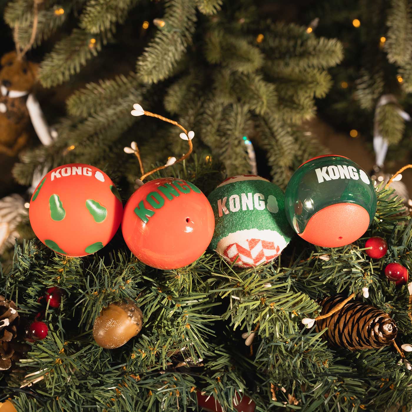 KONG Holiday Dog Chew Toys - 4 Pack Durable Rubber Balls for Chewing, Fetch & Play - Christmas, Thanksgiving & New Year Pet Gifts for Small & Large Dogs