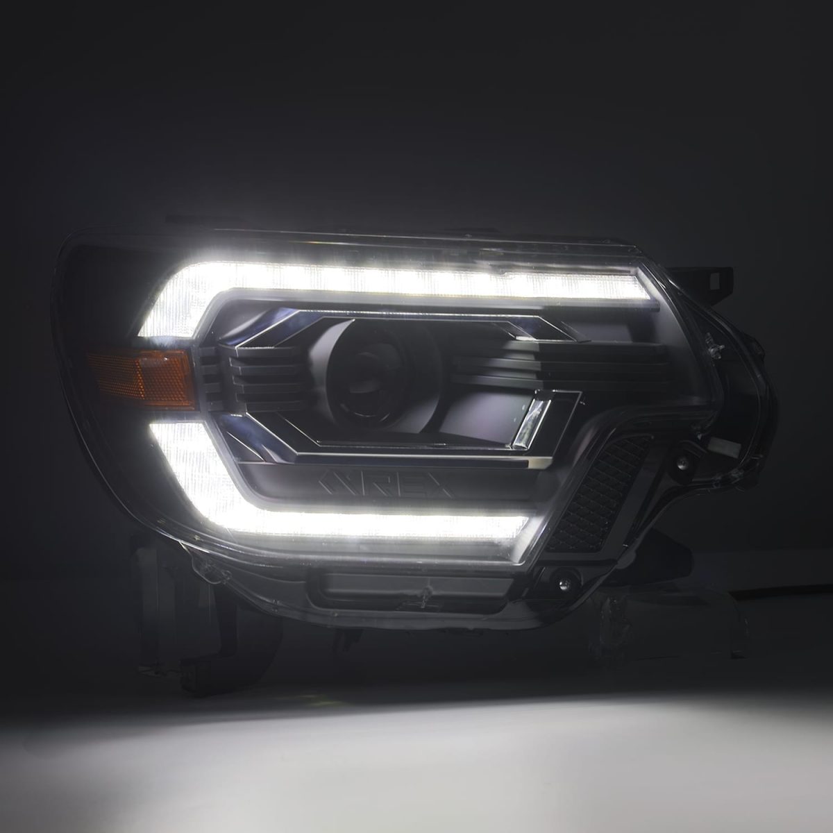 2012-2015 Toyota Tacoma AlphaRex PRO Series Halogen Projector Headlights - Black Housing - Upgrade Your Truck's Lighting for Night Driving & Off-Road Adventures