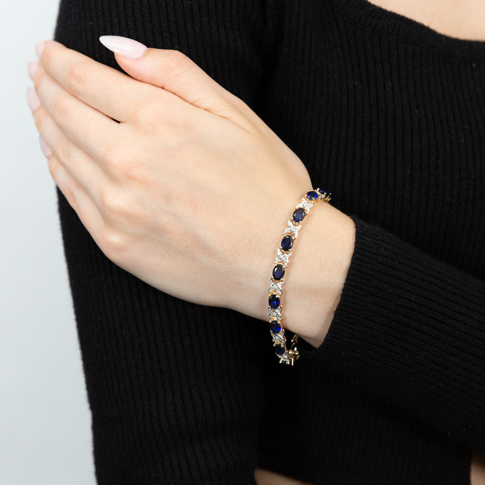9ct Yellow Gold 7x5mm Oval Cut Lab-Created Sapphire & Diamond 19cm Crossover Bracelet for Women - Elegant Gift for Anniversary, Birthday & Special Occasions