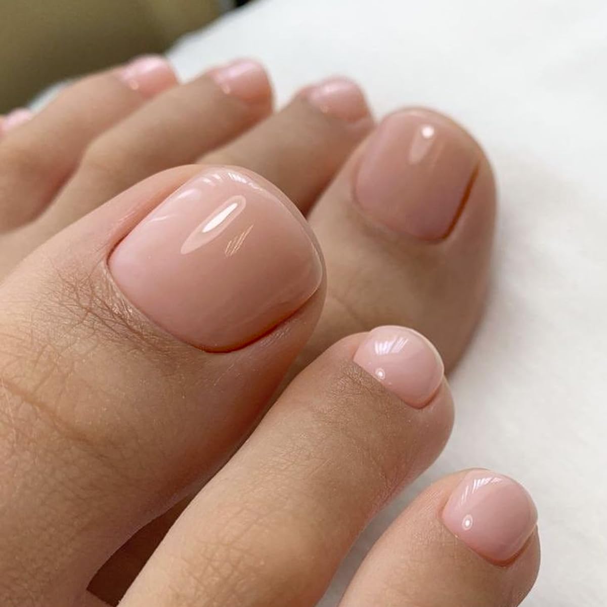 GLAMERMAID 24Pcs Press on Toenails - Spring Summer Pure Nude Gel Fake Nails with Glossy UV Finish, Reusable Acrylic False Toe Nails Manicure Kit for Women | Perfect for Pedicures, Vacations & Special Occasions