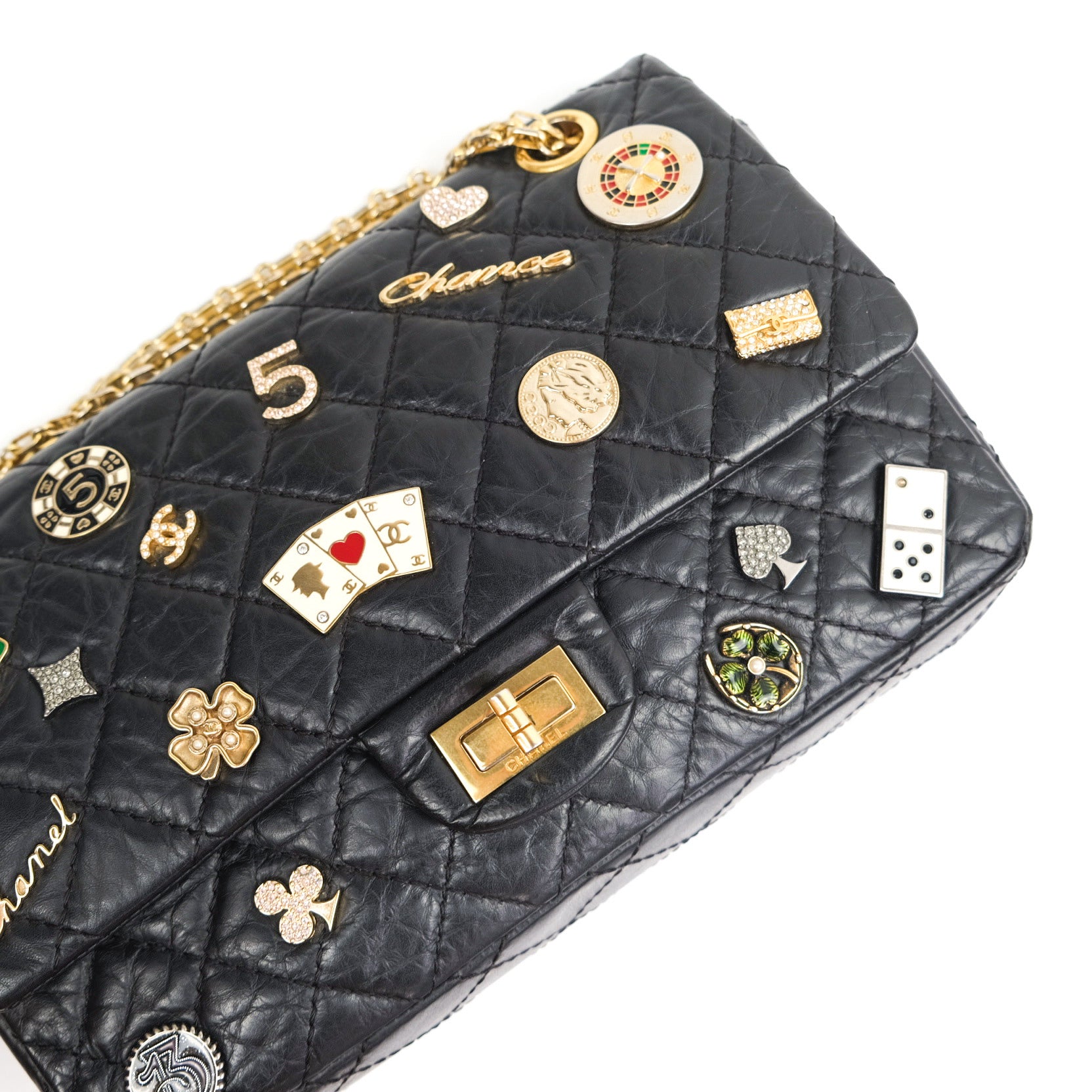 Authentic Chanel 2.55 Reissue 225 Flap Bag - Black Aged Calfskin Leather with Lucky Charms - Perfect for Luxury Fashion, Evening Events & Collector's Items