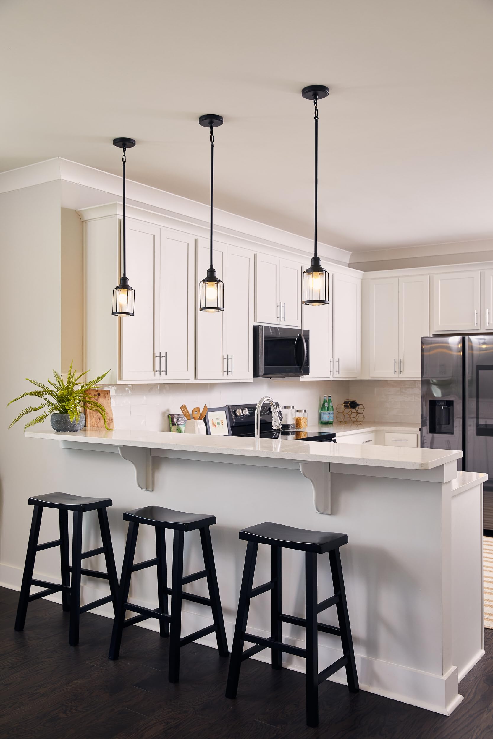 Quoizel Ludlow 1-Light Mini Pendant Light in Earth Black - Elegant Steel Construction with Clear Glass Shade for Kitchen Island, Dining Room, or Entryway - Transitional Style Hanging Light Fixture Compatible with Sloped Ceilings