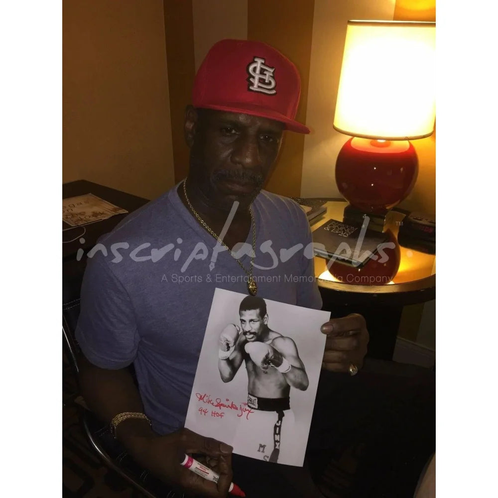 Michael Spinks Autographed 8x10 Photo with COA - Inscribed by Leon - Legendary Boxing Match vs Mike Tyson - Perfect for Sports Memorabilia Collectors and Boxing Fans
