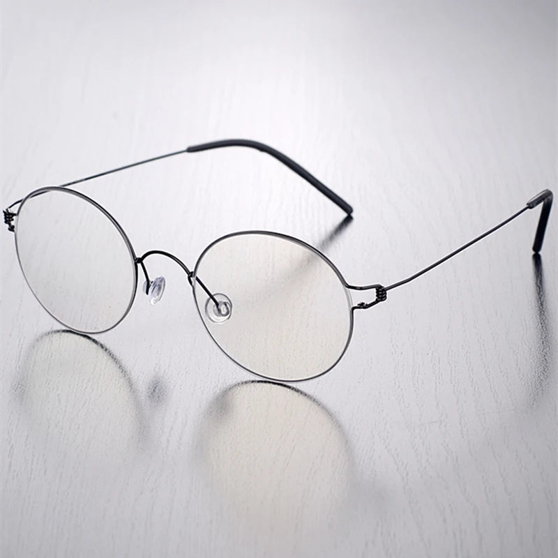 Stylish Black Titanium Full Rim Round Screwless Eyeglasses for Women - Lightweight & Durable Frame for Work, Reading & Everyday Fashion