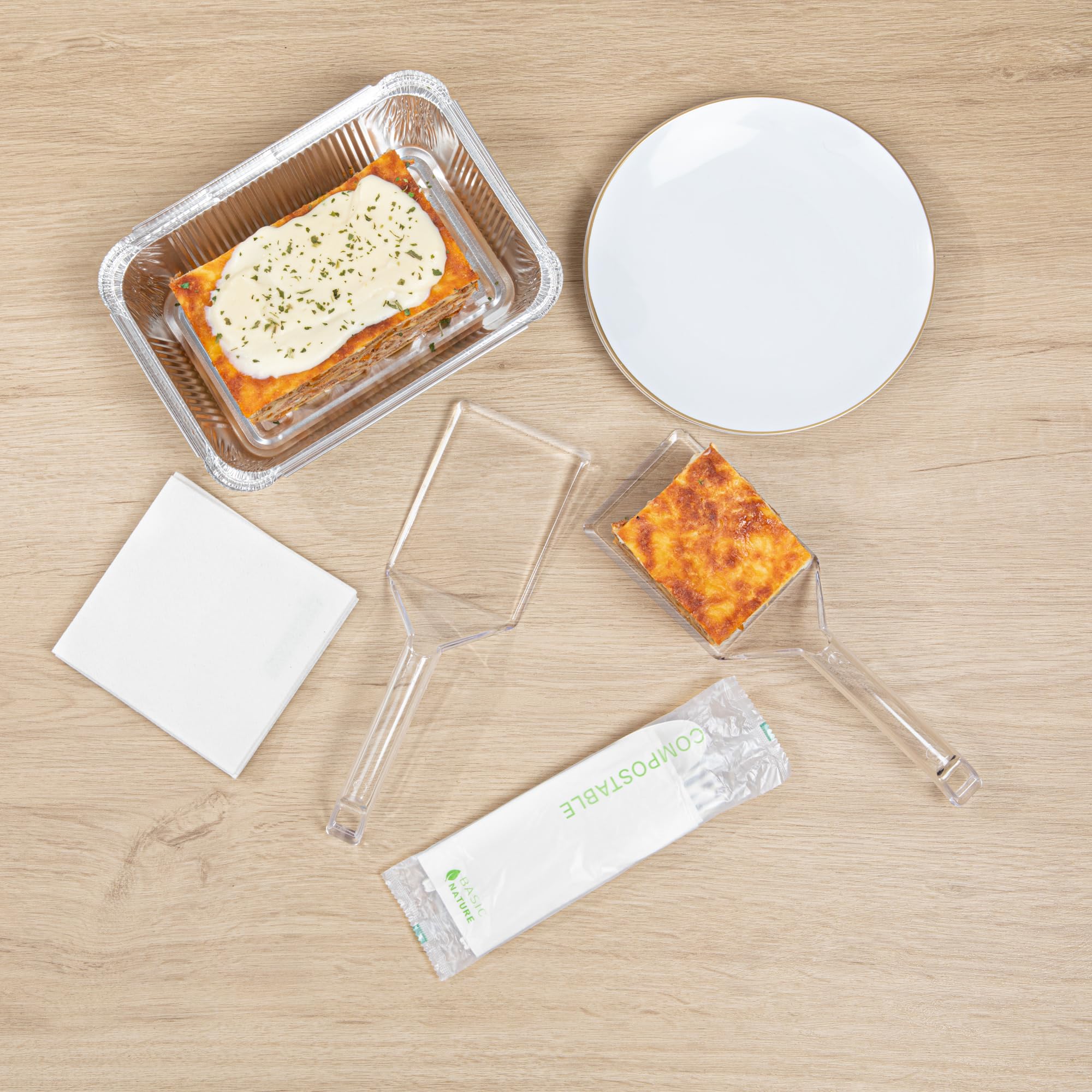 Restaurantware Cater Tek 10 Inch Disposable Serving Spatulas - 100 Pack Heavy-Duty Clear Plastic Lasagna Spatulas with Wide Edge & Comfortable Handle for Brownies, Cakes, Eggs - Perfect for Catering, Buffets, and Food Service