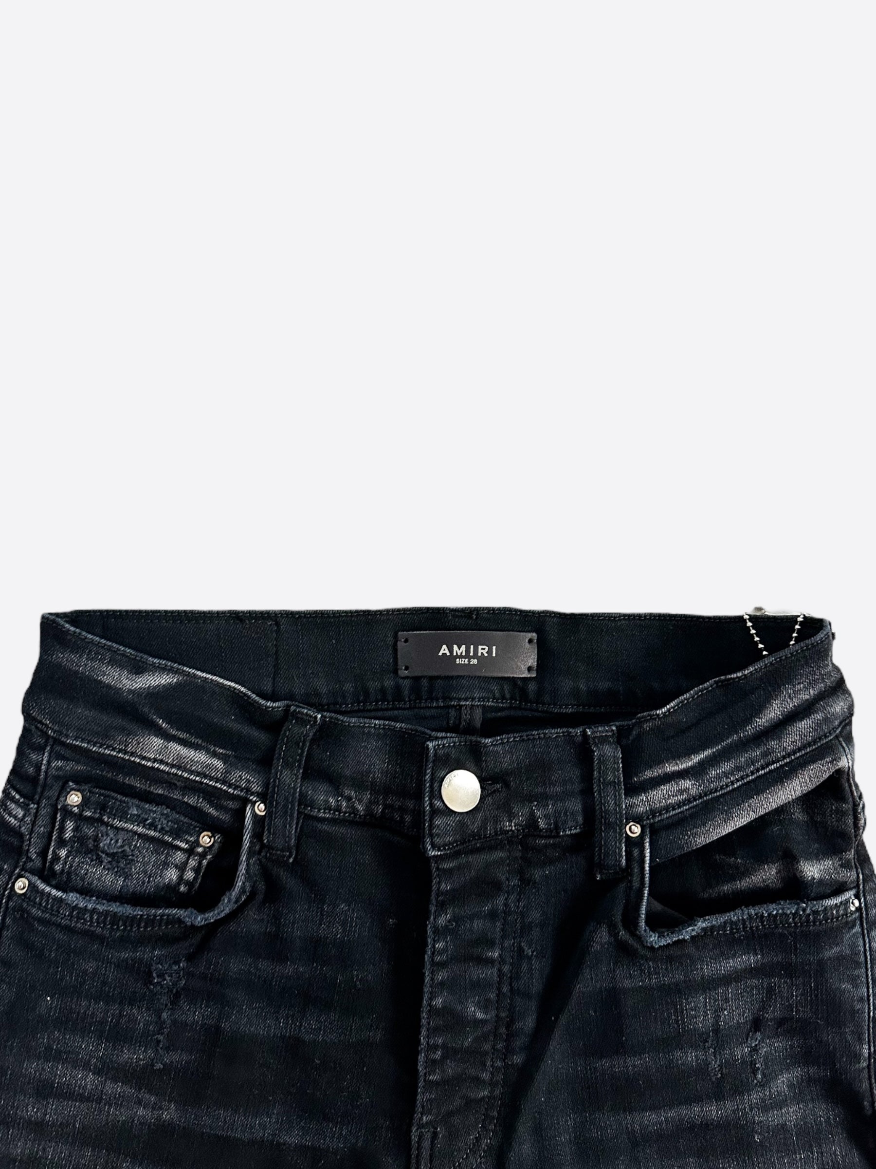 Amiri Aged Black Camouflage Core Applique Logo Jeans for Men - Distressed Denim Pants with Unique Design, Perfect for Streetwear and Casual Outfits