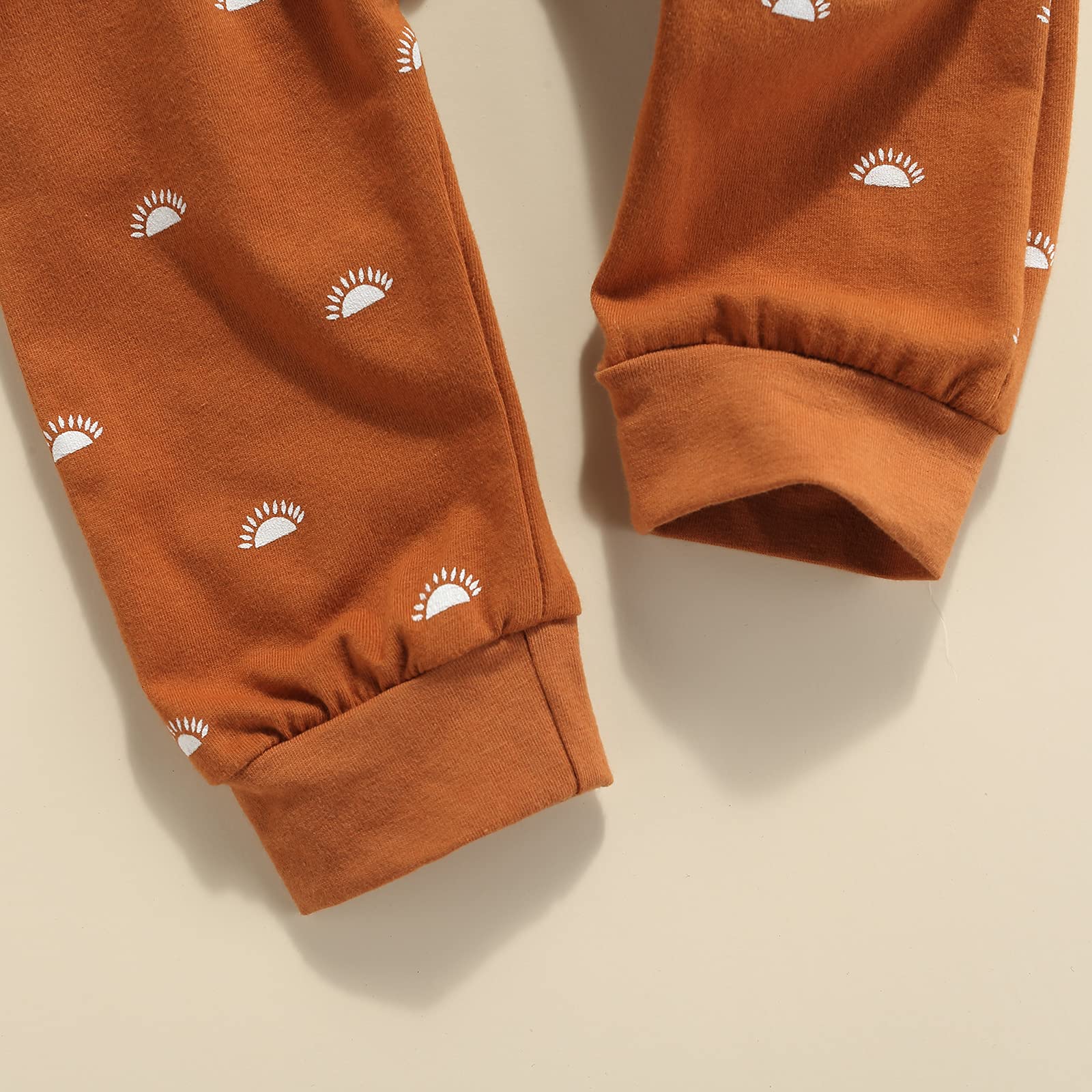 **Newborn Baby Boy & Girl 2-Piece Spring & Autumn Outfit Set – Sun Print Long Sleeve Crew Neck Pullover Sweatshirt & Pants (Brown Sun, 6-12 Months) – Perfect for Playdates, Family Photos & Casual Outings**