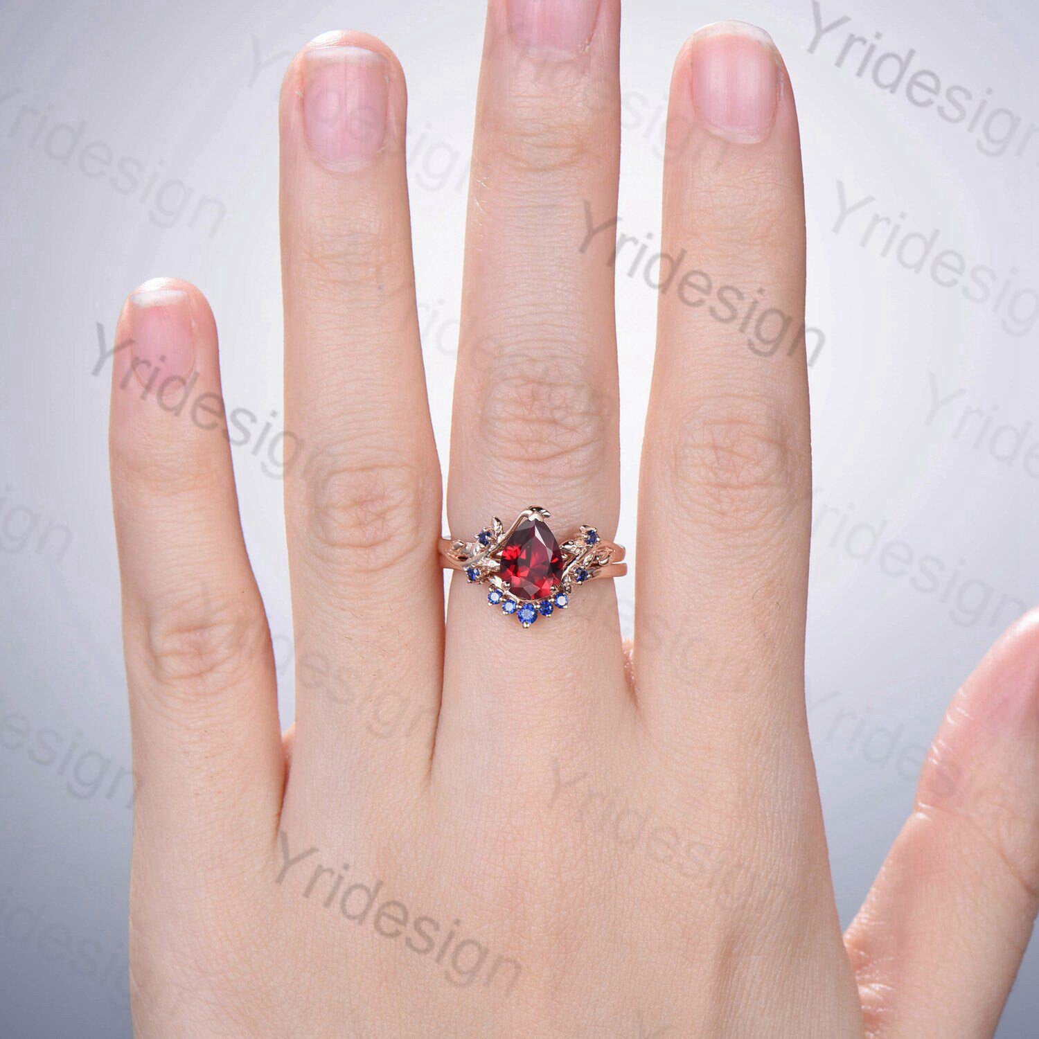Vintage Nature-Inspired Pear Shaped Ruby Wedding Ring Set - Unique Lab-Created Ruby Engagement Ring with Leaf Cluster Design & Blue Sapphire Accents - Perfect for Women's Anniversary, Proposal, and Special Occasions