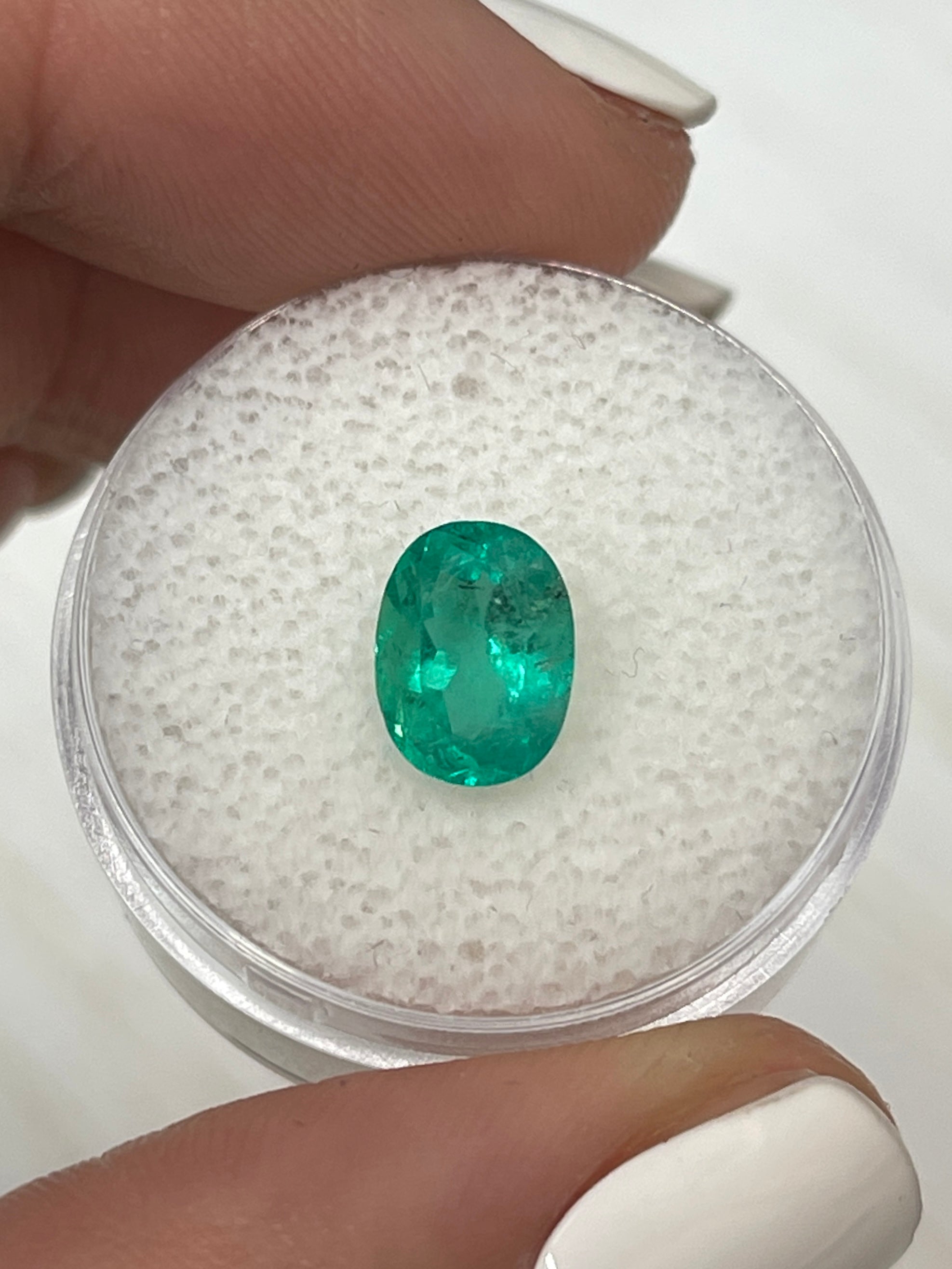 1.74 Carat 9x7mm Natural Colombian Emerald Oval Cut Loose Gemstone - Bluish Green with Freckles for Jewelry Making & Engagement Rings