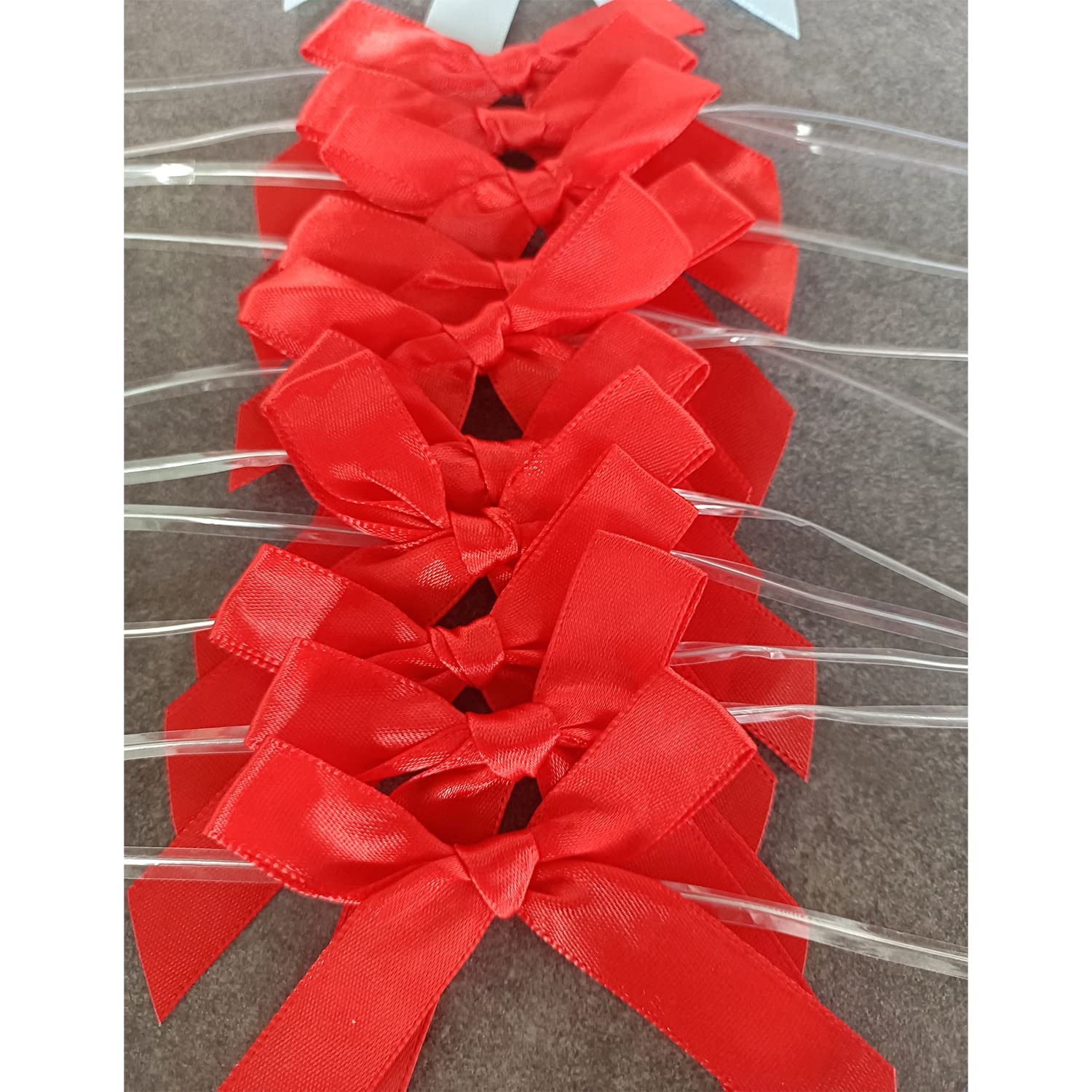 50 Pack Red Twist Tie Bows - Pre-Tied Christmas Satin Bows for Treat Bags, Candy & Apple Packaging, DIY Decorations - Perfect for Holiday Gifts, Party Favors & Home Decor