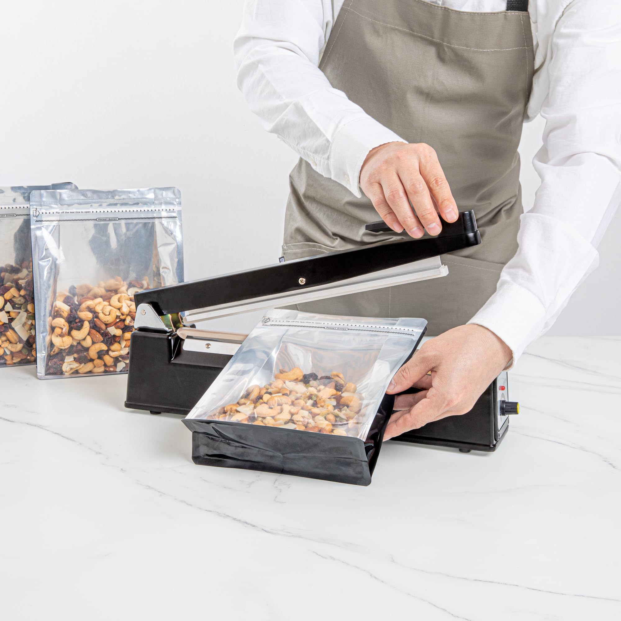 Restaurantware 12 Inch Manual Heat Sealer Machine - Industrial Grade Food Safe Impulse Sealer with Adjustable Temperature Control, Portable Black Aluminum Sealing Equipment for Food Packaging, Vacuum Sealing & Meal Prep