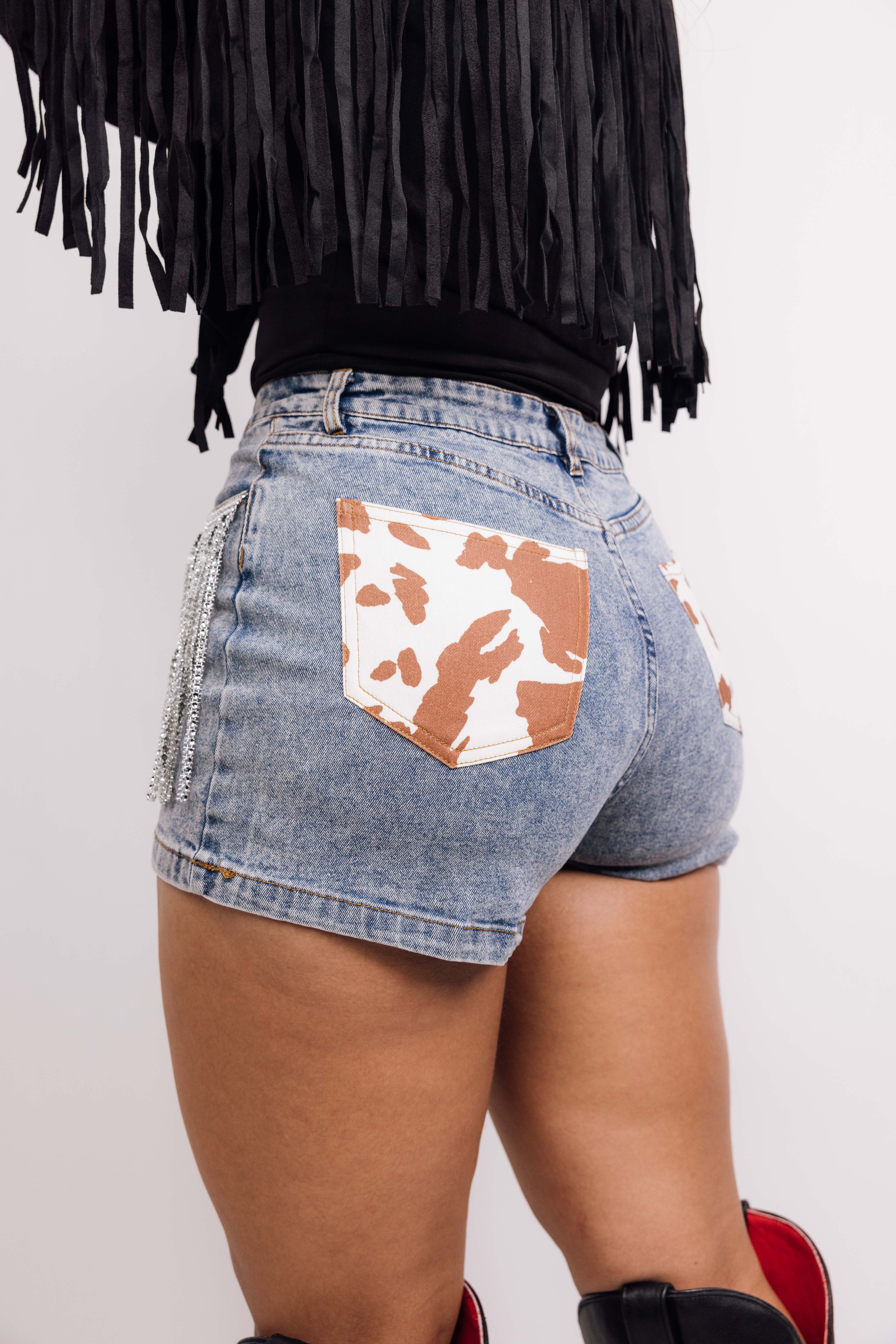 Trendy Washed Silver Fringe Cow Print Shorts for Women - Stylish Western Denim Cutoffs for Summer, Music Festivals & Boho Outfits
