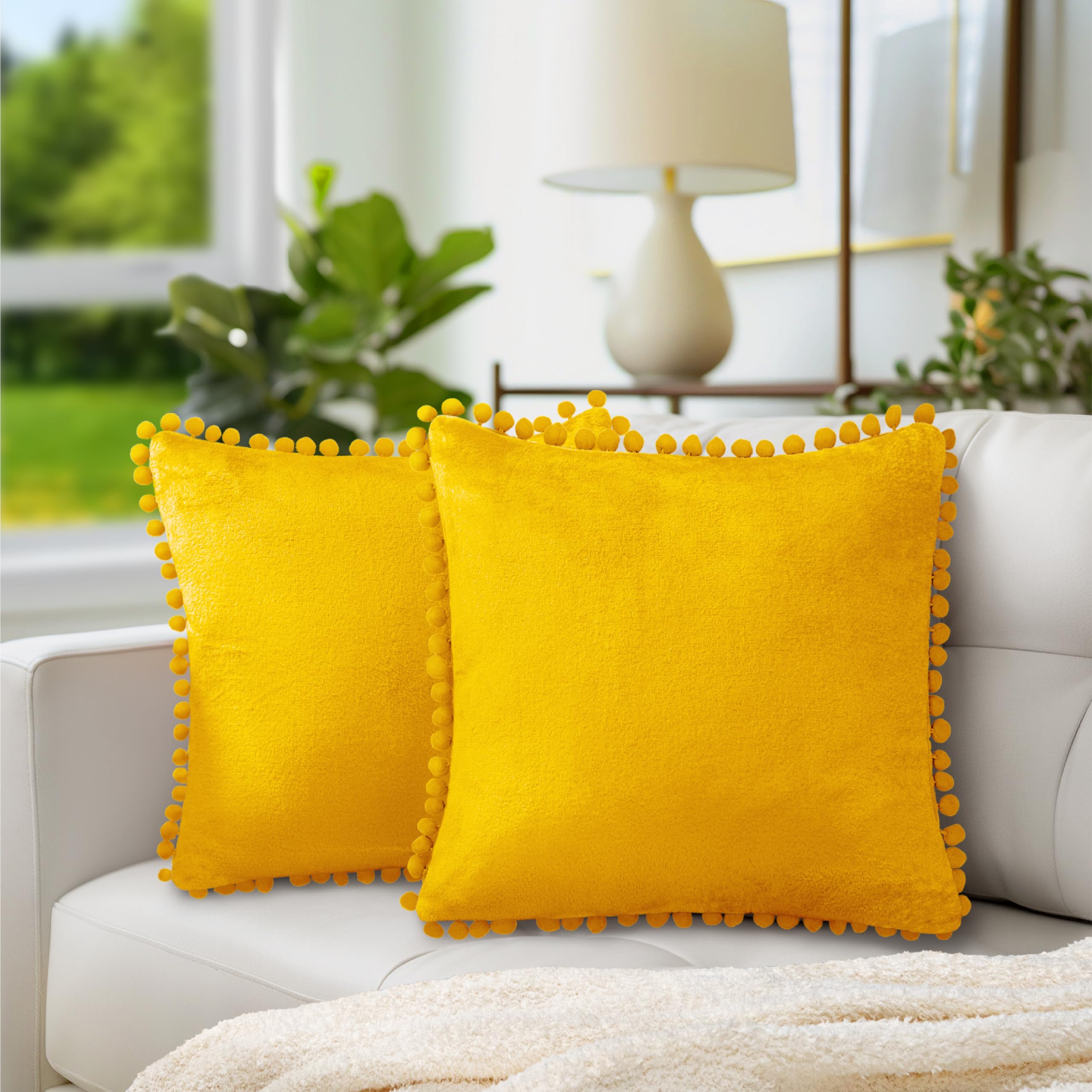 PAVILIA Mustard Yellow Velvet Euro Plush Throw Pillow Covers with Pom Pom - Set of 2 (20x20 Inches) - Decorative Cushion Covers for Bed, Sofa & Couch - Soft Luxury Pillowcases for Bedroom Aesthetic & Living Room Decor