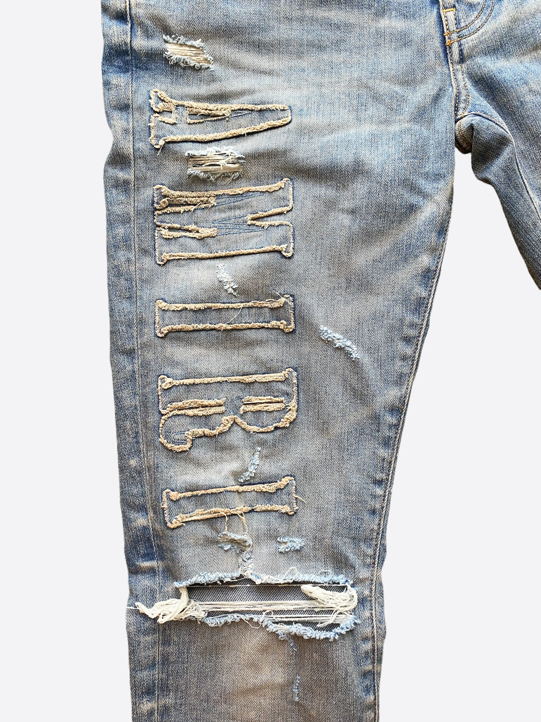 Amiri Logo Applique Blue Distressed Denim Jeans for Men - Stylish Vintage Washed Slim Fit Designer Jeans | Perfect for Casual Wear, Night Out and Street Fashion