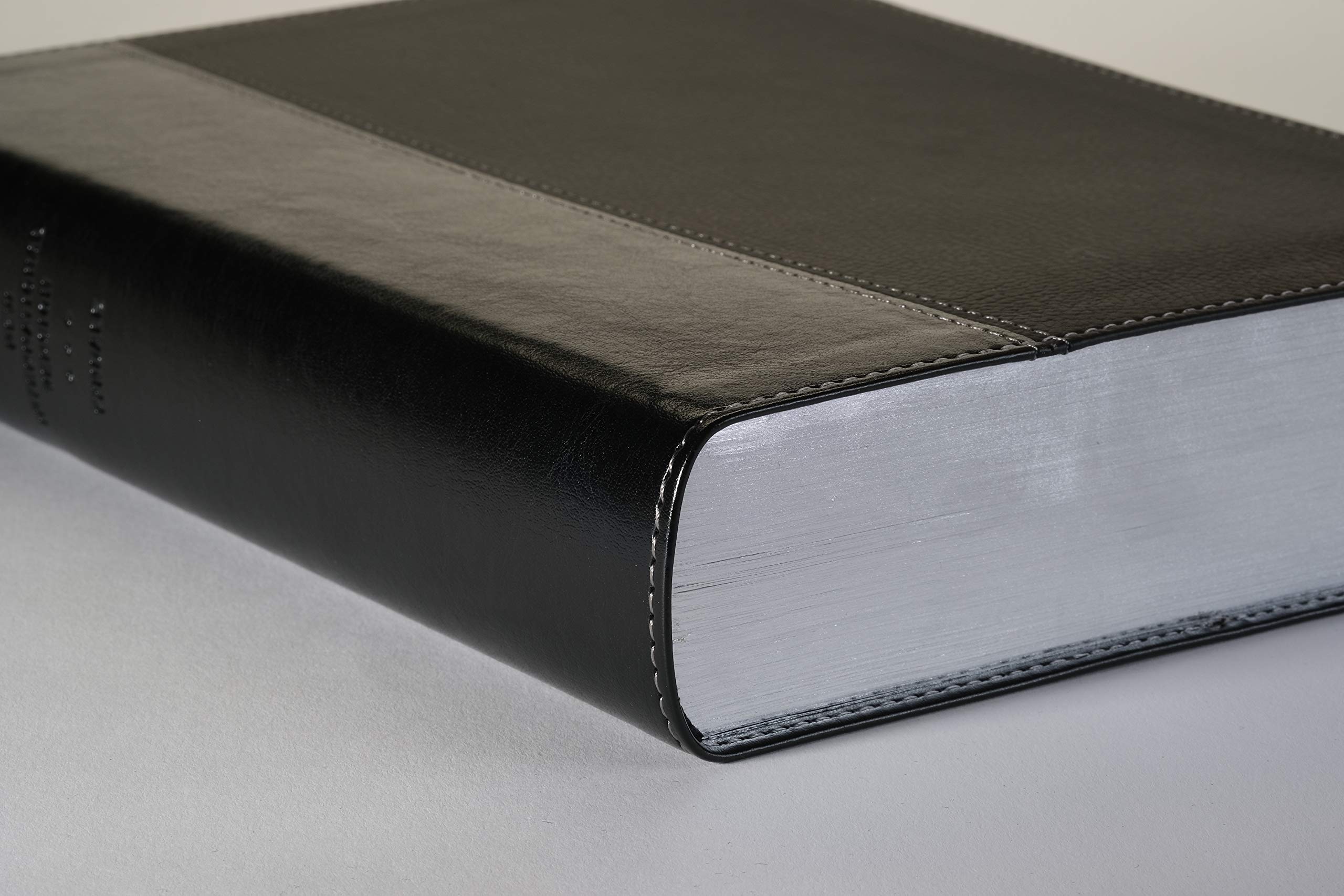 Every Man's Bible NIV, Large Print, TuTone LeatherLike (Onyx/Black) - Study Bible for Men with Devotional Notes, Book Introductions & 44 Charts - Perfect for Personal Study, Small Groups & Men's Ministry