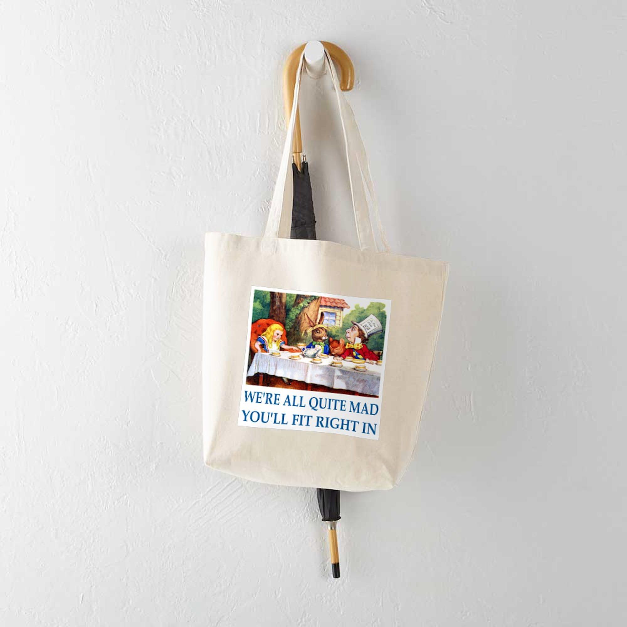 WE're ALL QUITE MAD Natural Canvas Tote Bag - Reusable Eco-Friendly Shopping Bag for Groceries, Beach & Daily Use | CafePress