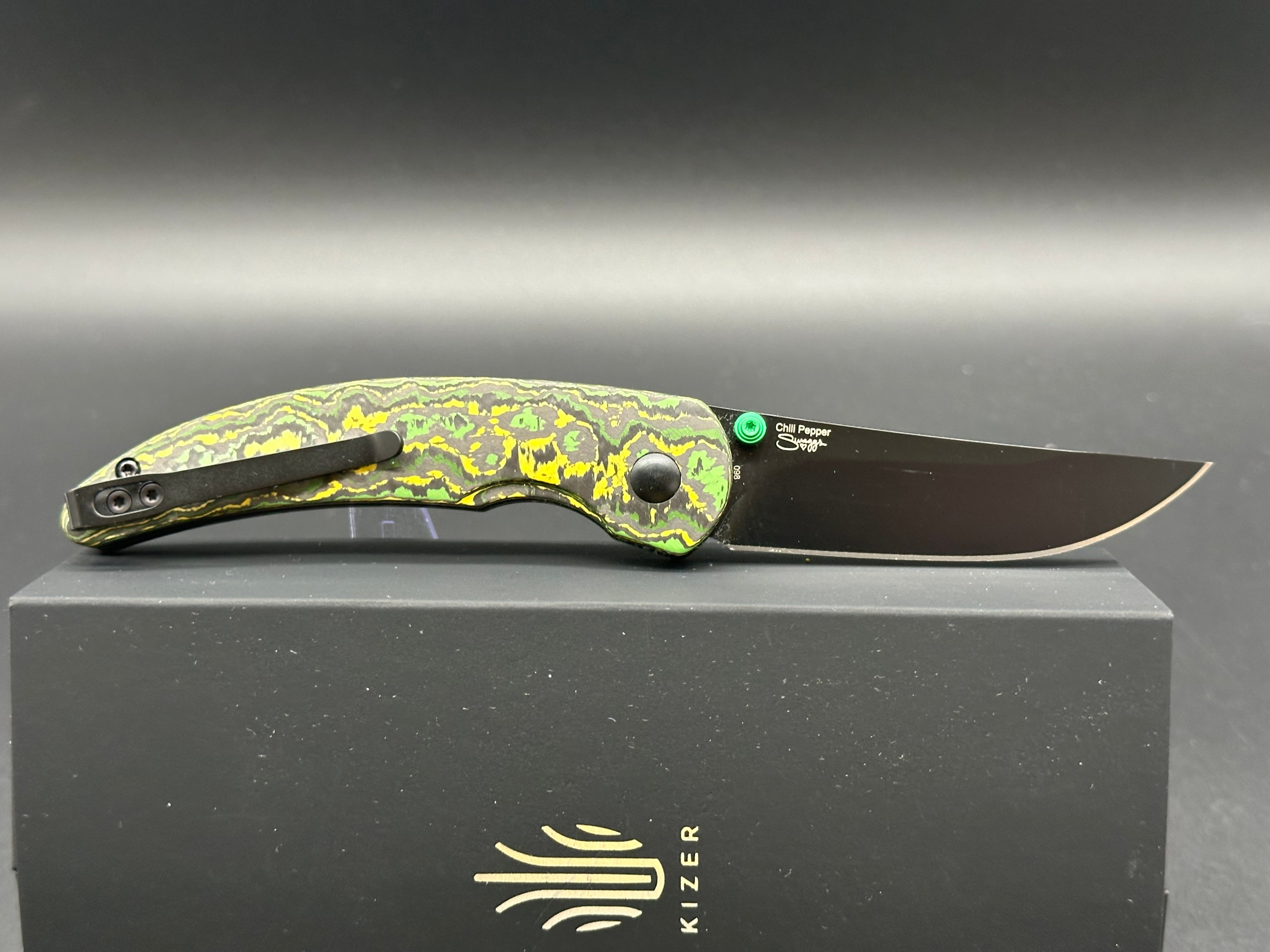KIZER Chili Pepper Button Lock Knife - S90V Plain Black Blade, Toxic Storm Fatcarbon Handle - EDC Pocket Knife for Outdoor, Camping & Everyday Carry
