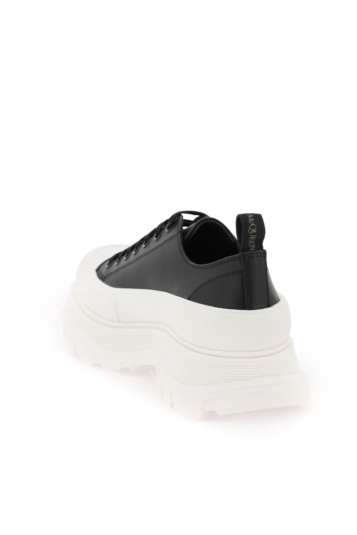 Alexander McQueen Tread Slick Sneakers with Graffiti Logo - Stylish Designer Shoes for Men & Women | Perfect for Streetwear, Casual Outfits & Fashion Events