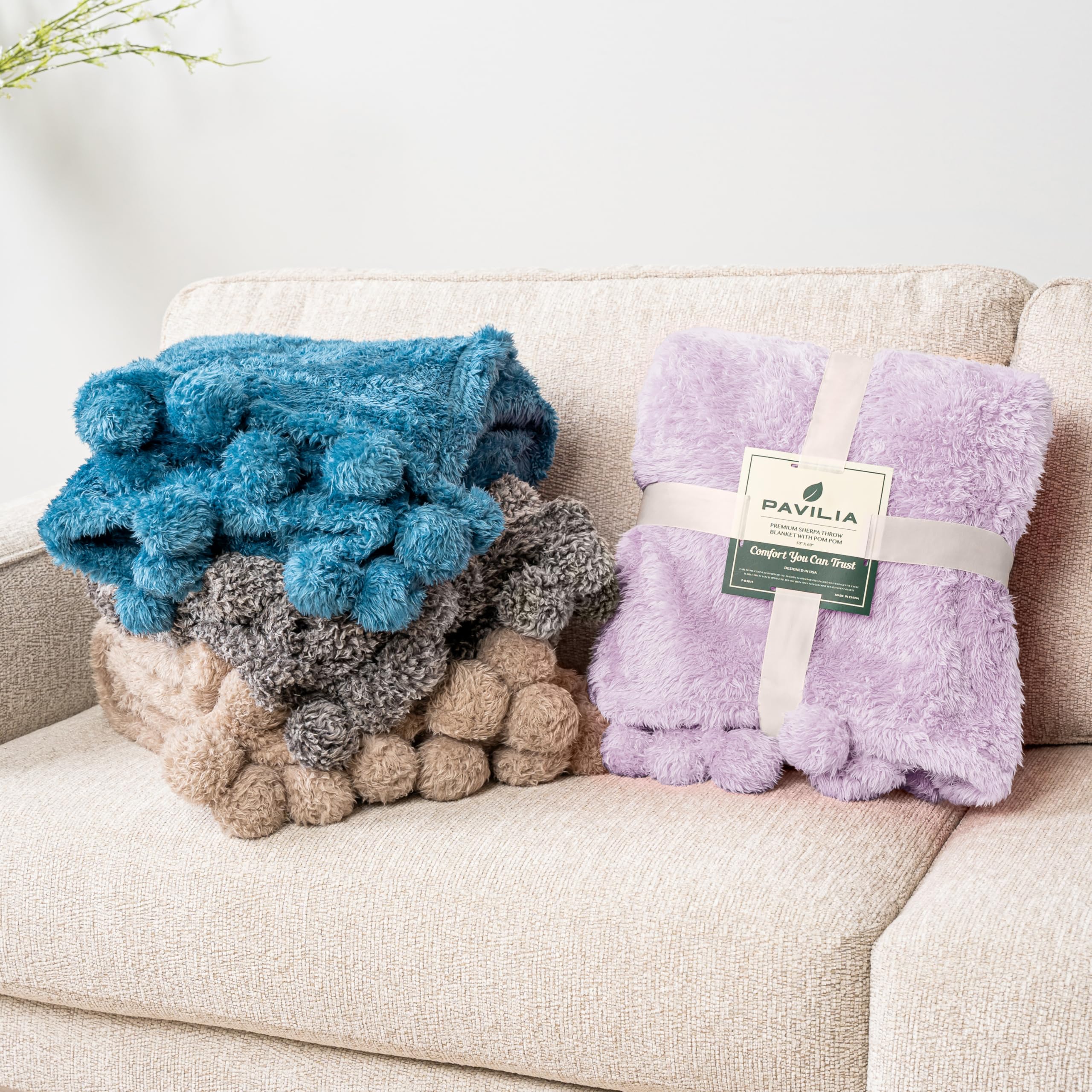 PAVILIA Lavender Sherpa Throw Blanket - Ultra Soft Plush Pom Pom Blanket for Couch & Bed (60x80 inches) | Lightweight Cozy Fluffy Blanket for Sofa, Living Room, Dorm & Travel | Light Purple Twin Size Warm Fuzzy Blanket