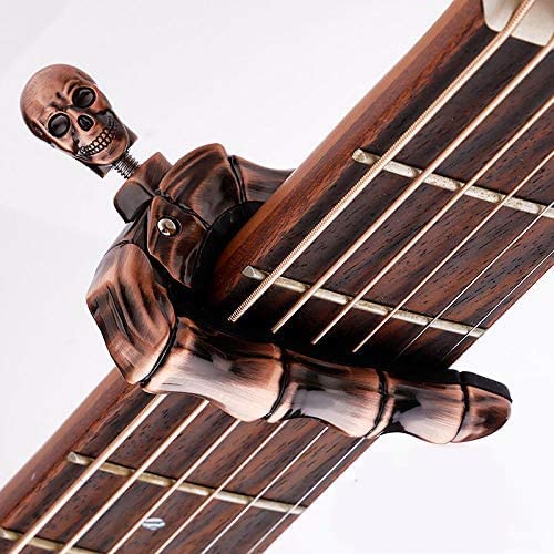 Premium Geva Guitar Capo with Skull Knob - Universal Clamp for Acoustic & Electric Guitars, Bass, Ukulele, Banjo (4-12 Strings) - Durable Bronze Finish - Perfect for Stage Performances, Studio Recording & Practice Sessions