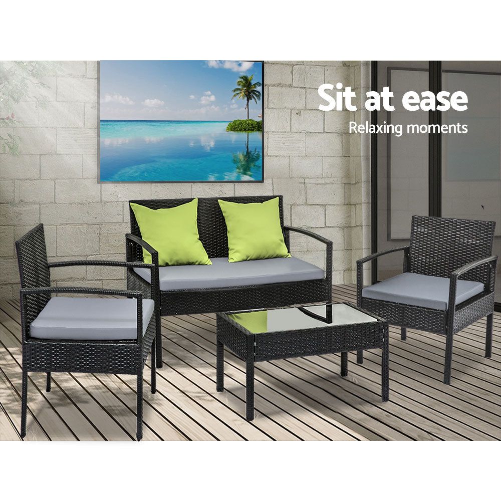 4-Seater Outdoor Wicker Sofa Set with Table and Cushions - Patio Garden Furniture for Lounge, Bistro & Backyard Relaxation - Black Rattan Furniture