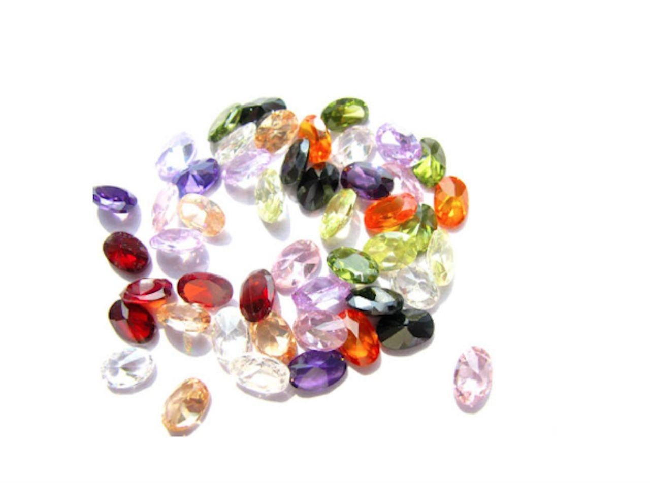 Wholesale 6x4mm 20x15mm Oval Cubic Zirconia (CZ) Stones - Diamond Cut in Pink, Yellow, Lavender, Purple, Red, Tanzanite & Champagne Colors for Jewelry Making, Engagement Rings & DIY Crafts