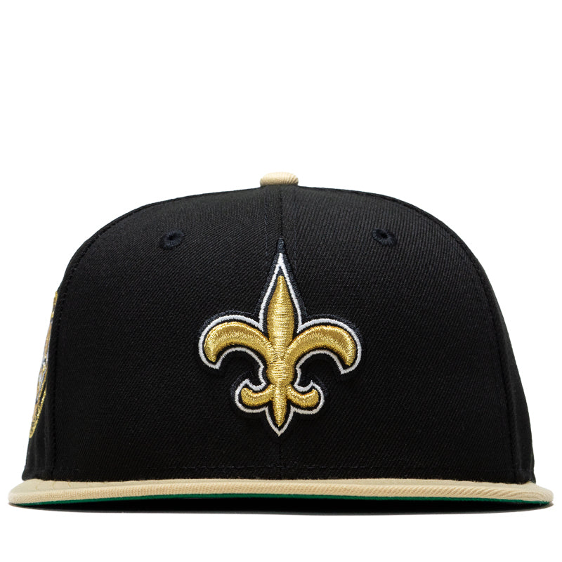 New Era x Politics New Orleans Saints 59FIFTY Fitted Cap - Black/Vegas Gold - Official NFL Snapback Hat for Men & Women - Perfect for Football Games, Sports Events & Streetwear Fashion