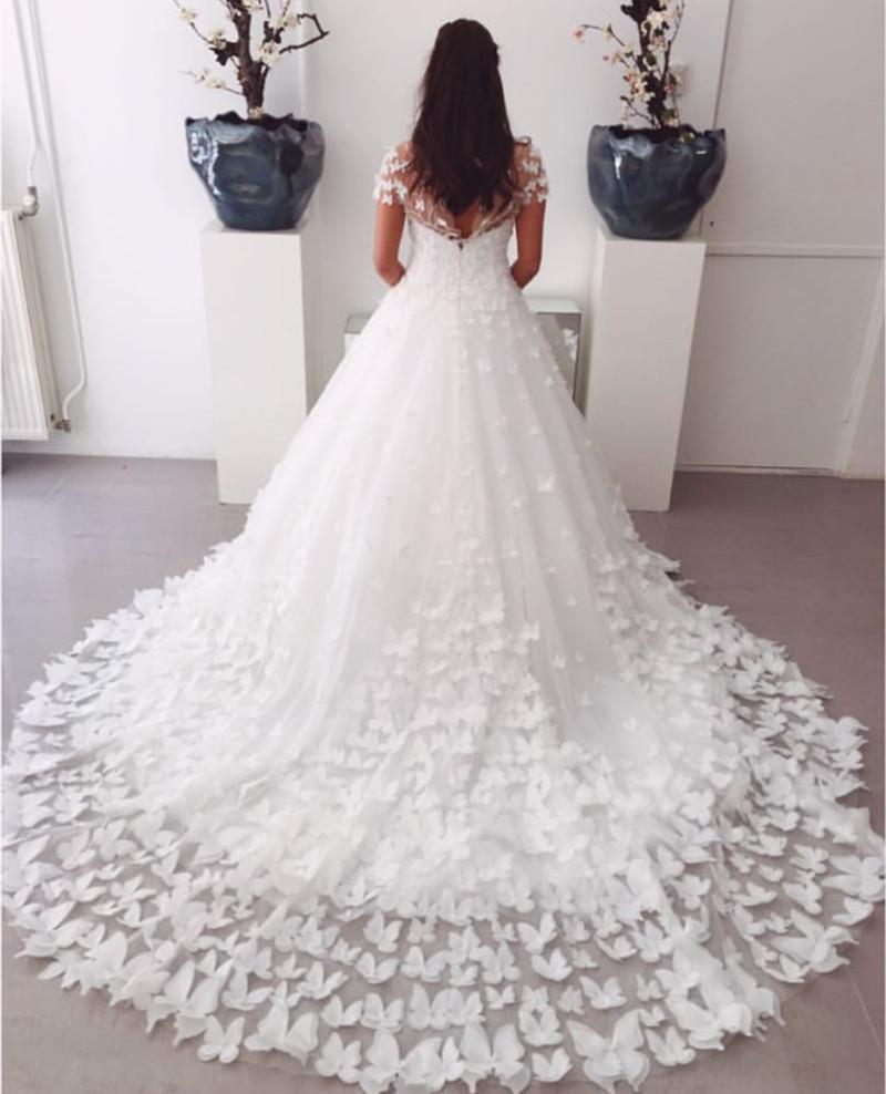 Elegant A-Line Sweep Train Butterfly Wedding Dress with Lace Cap Sleeves – Perfect for Bridal Ceremony, Garden Wedding & Romantic Photos