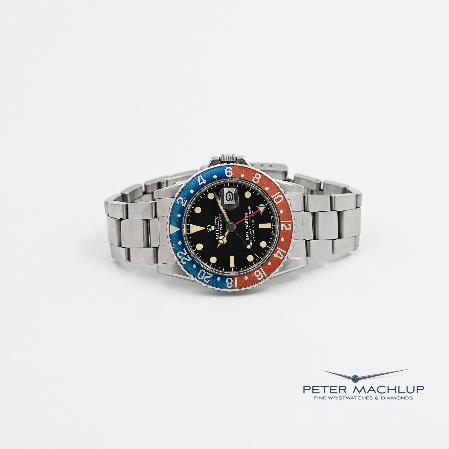 Vintage Rolex GMT-Master Pepsi 1675 Men's Watch - 1975 Model, Stainless Steel, Red & Blue Bezel - Perfect for Collectors & Travel Enthusiasts